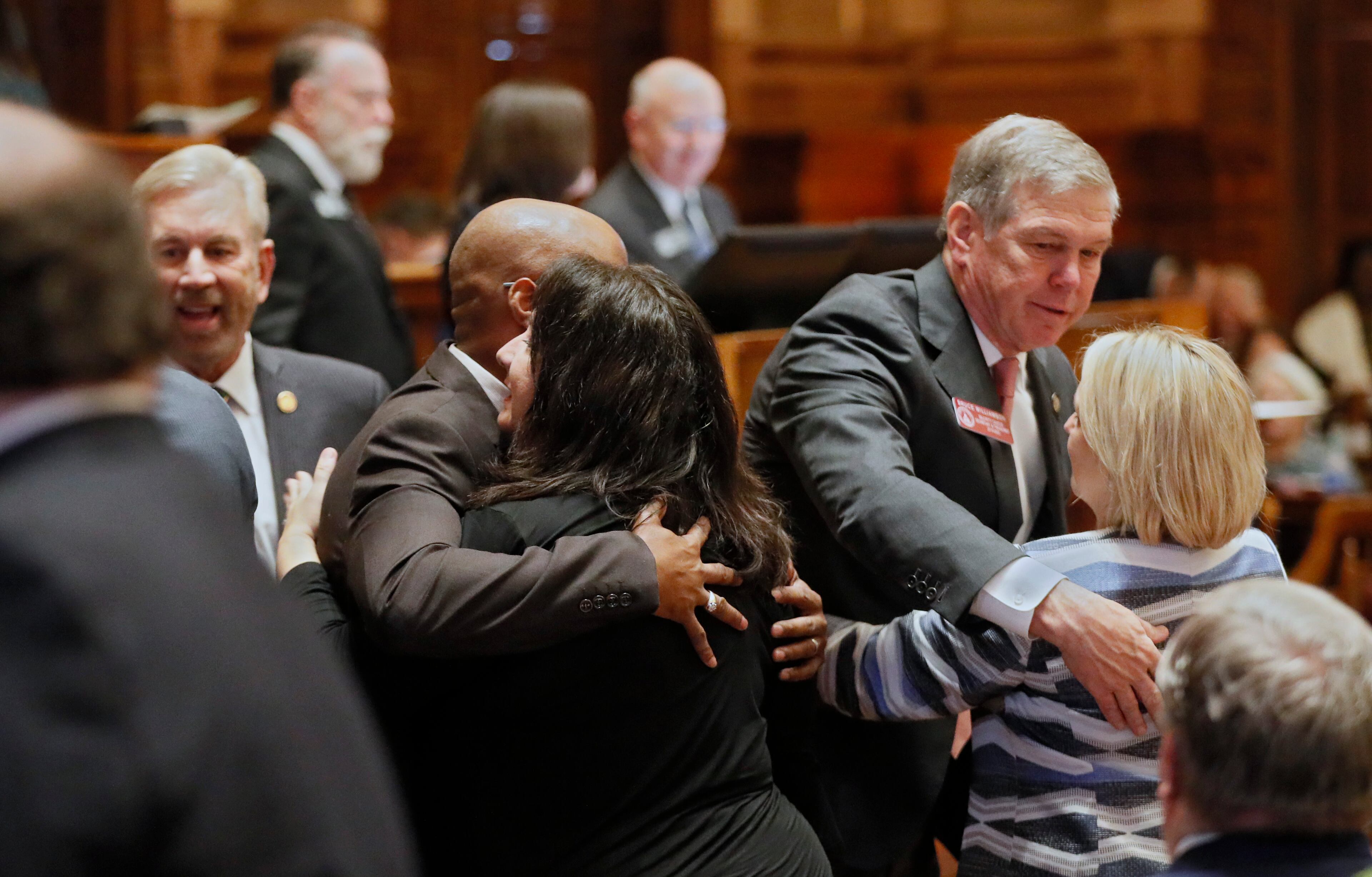 January 13, 2020 - Atlanta - House members hug family members of Georgia House Rules Chairman Jay Powell, who died during a retreat of Republican legislative leaders last November, after House Speaker David Ralston eulogized him during morning orders. The Georgia General Assembly started its 2020 session amid a backdrop of an election year. ACLU volunteers greeted lawmakers and offered copies of the constitution. Bob Andres / bandres@ajc.com