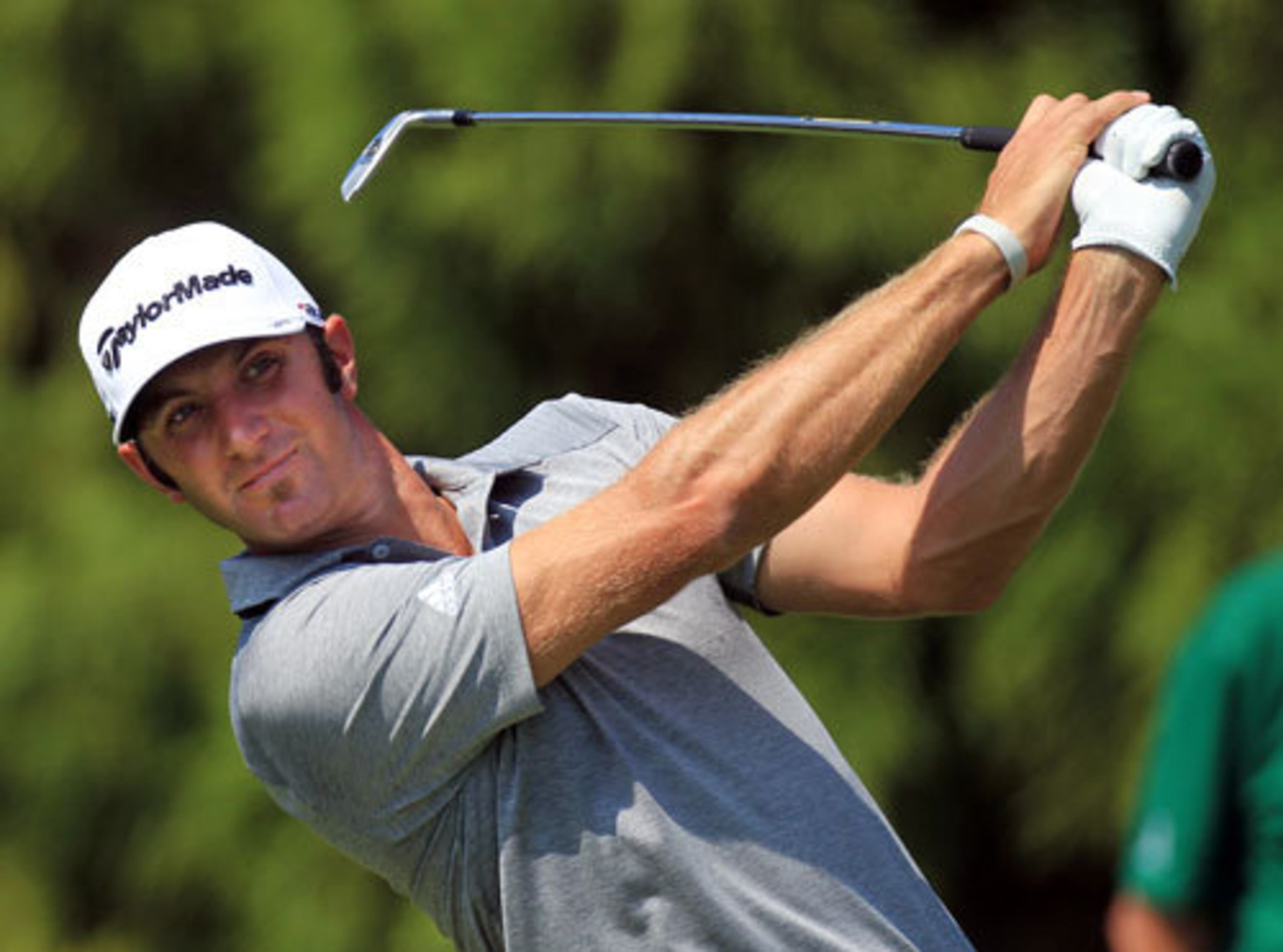 Webb Simpson tees off on the par 3 second hole during third round play.