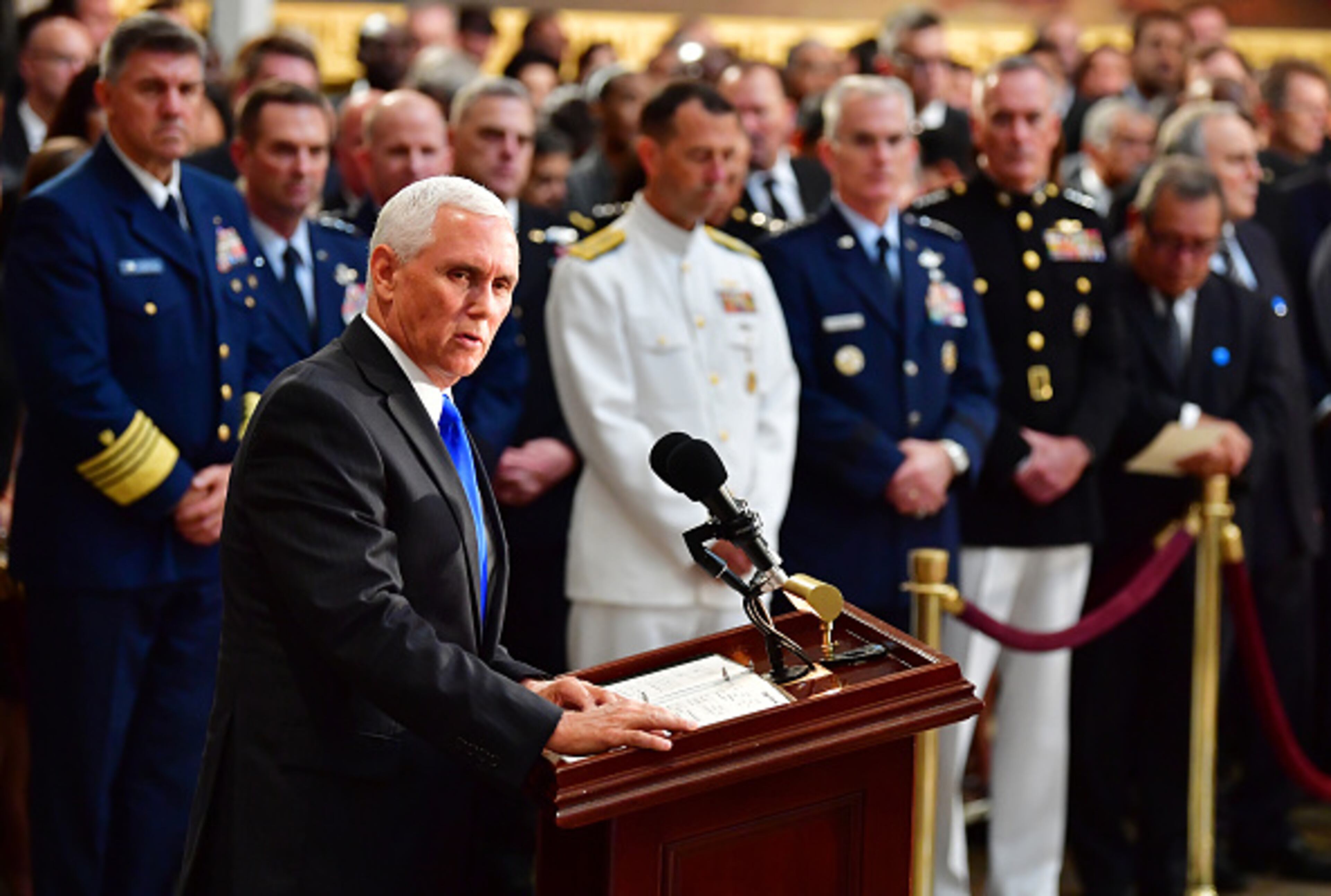 U.S. Vice President Mike Pence speaks as former Senator John McCain lies in state in the Capitol Rotunda at the U.S. Capitol, in Washington, DC on Friday, August 31, 2018. (Photo by Kevin Dietsch - Pool/Getty Images)