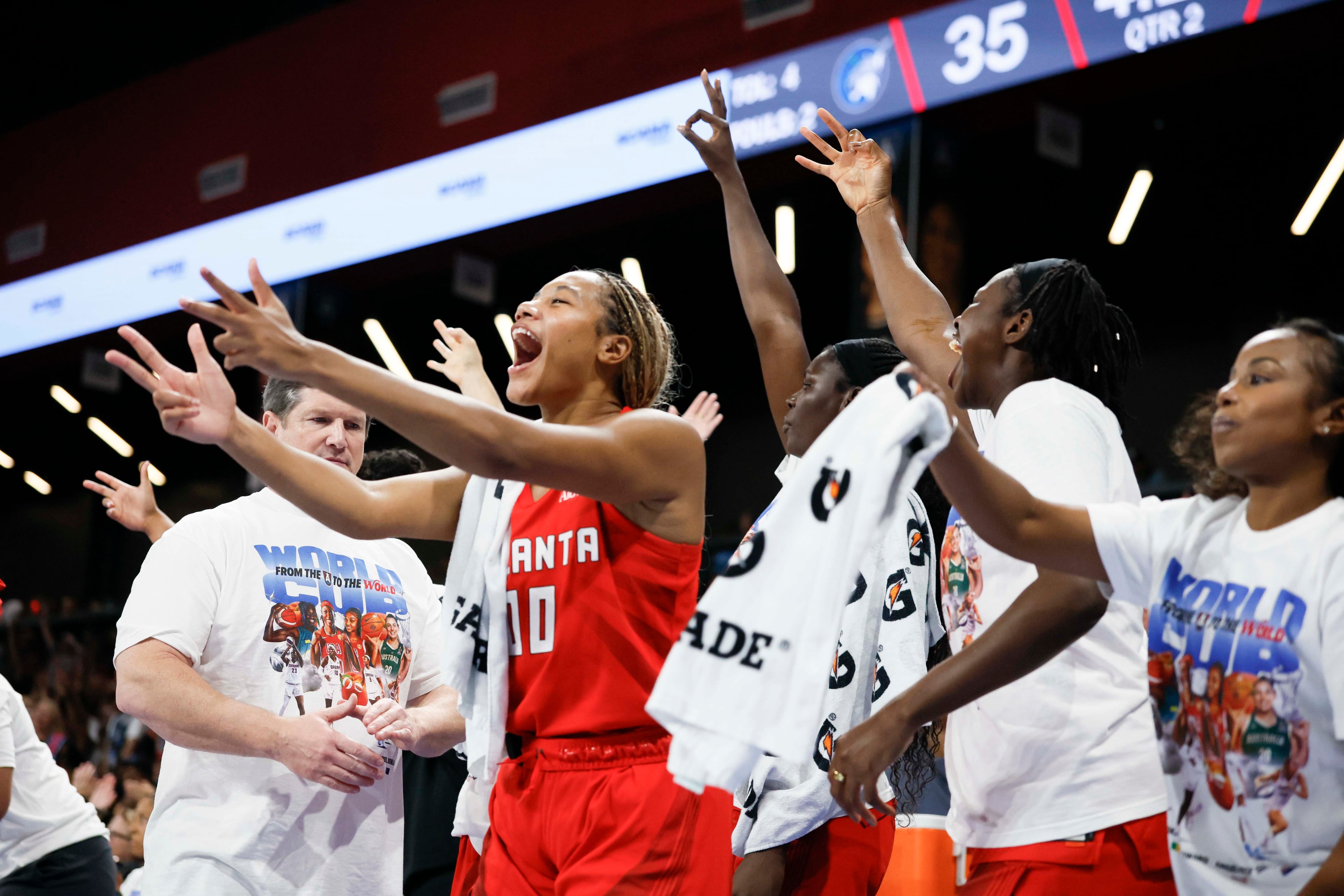 Atlanta Dream guard Rhyne Howard (center) reacts with teammates after a teammate scores a three-pointer during the second half of a WNBA game against the Minnesota Lynx at Gateway Center Arena on Sunday, Aug. 30, 2026, in Atlanta. (Miguel Martinez/ AJC)