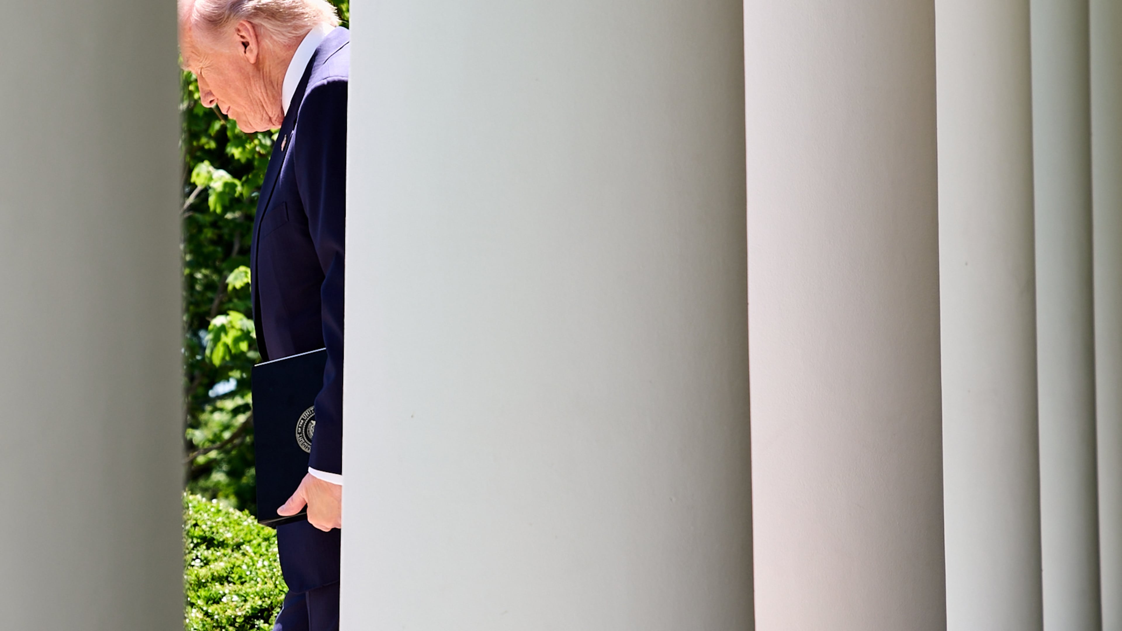 President Donald Trump walks through the Colonnade of the White House, as he arrives to attend a luncheon for mothers, Friday, May 8, 2026, in the Rose Garden of the White House, in Washington. (AP Photo/Jacquelyn Martin)