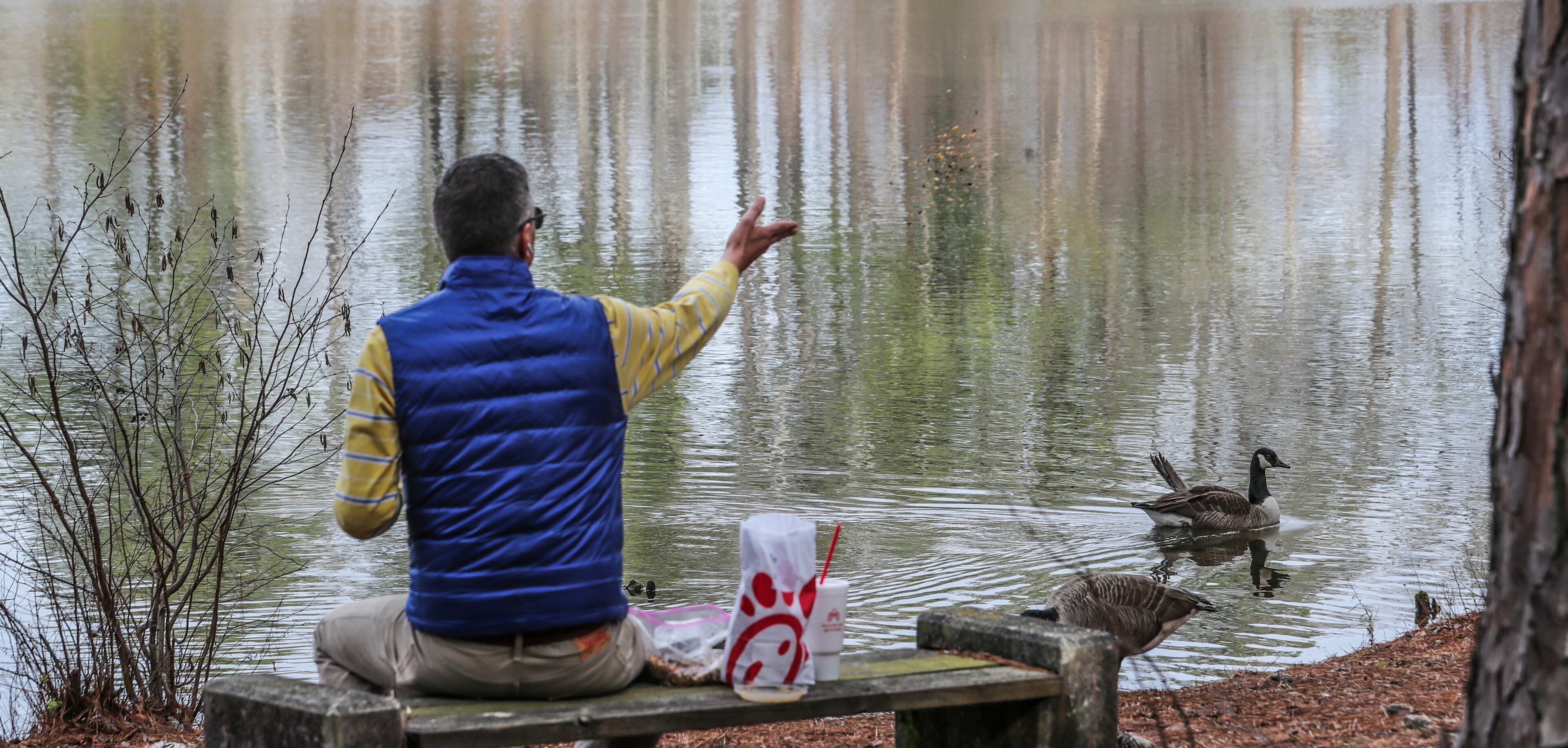 Michael Brown, who lives the area, often visits the lake to feed the geese at the Monastery. The monastery in Rockdale County was established in 1944 by a group of Roman Catholic “brothers” who traveled from the Gethsemani Abbey in Kentucky and is an unusual feature of the Conyers landscape that has become an attraction for visitors from across the Southeast, for those seeking a spiritual retreat or simply a nice outing. (John Spink / John.Spink@ajc.com)