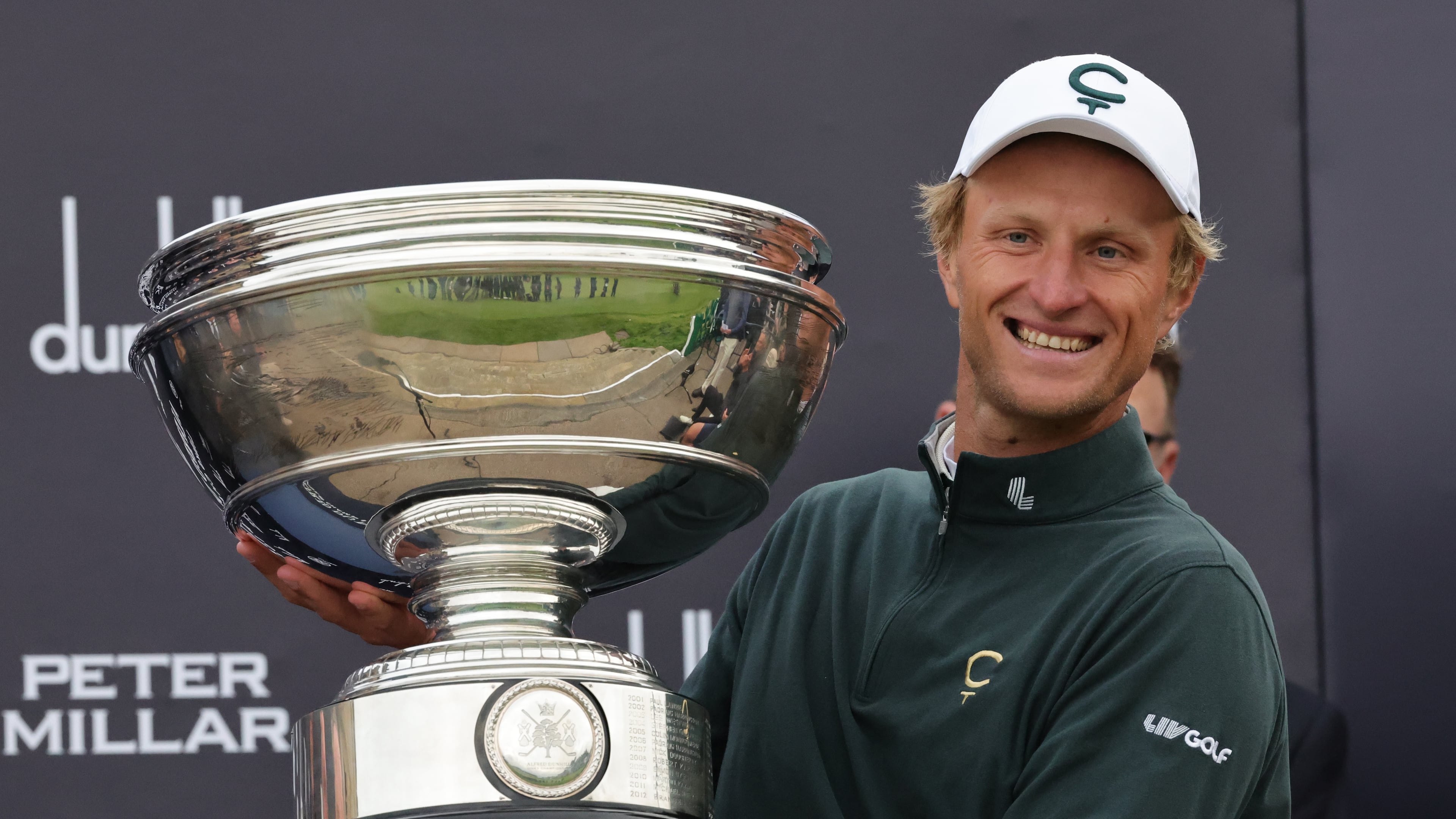 Adrian Meronk of Poland holds the trophy after winning the Alfred Dunhill Links Championship 2026 at the Old Course at St Andrews, Scotland, Sunday Oct. 4, 2026. (Steve Welsh/PA via AP)