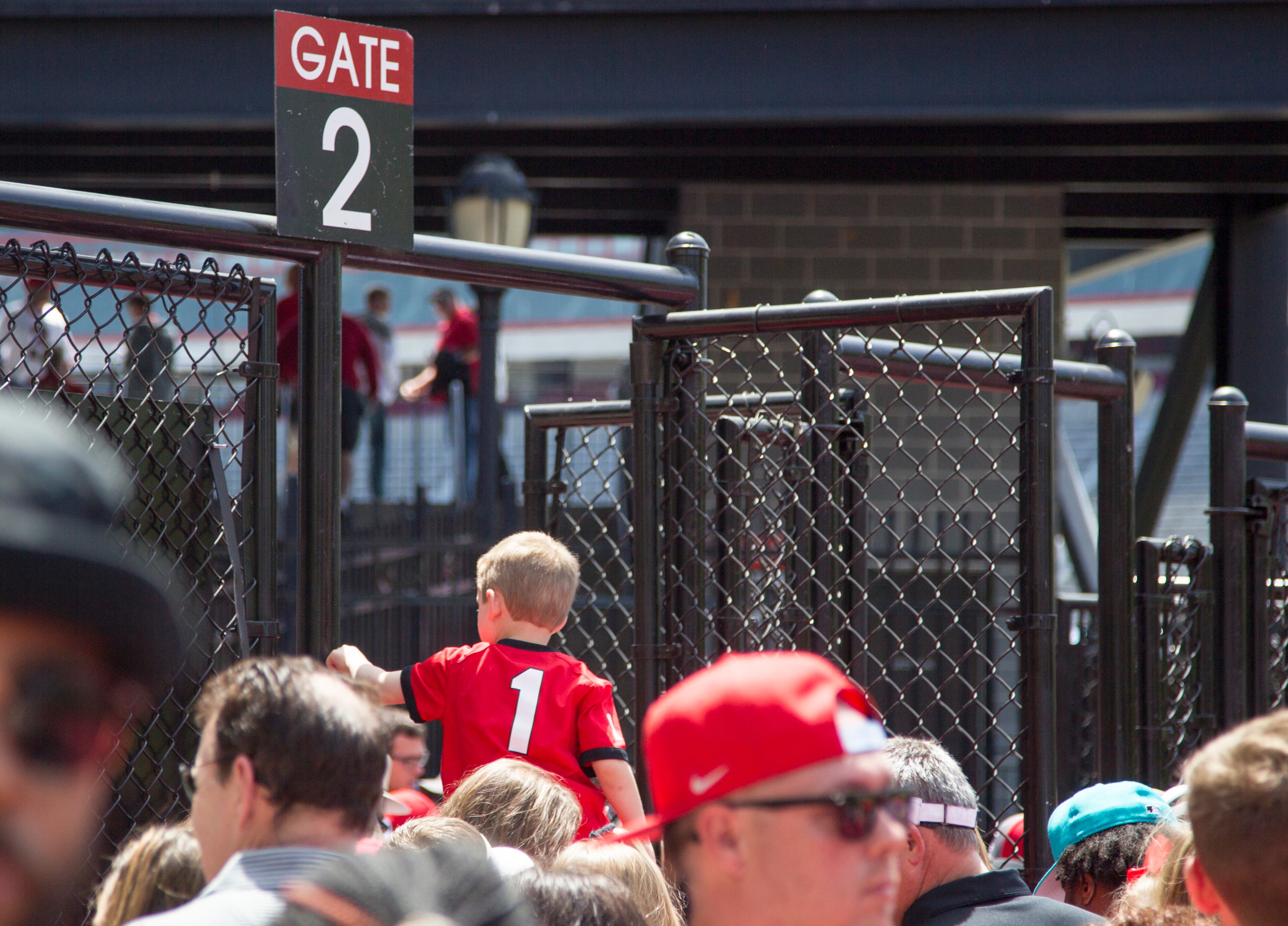 A young Georgia fan is seen before G-Day at the University of Georgia in Athens, Georgia, on Saturday, April 21, 2018. (REANN HUBER/REANN.HUBER@AJC.COM)