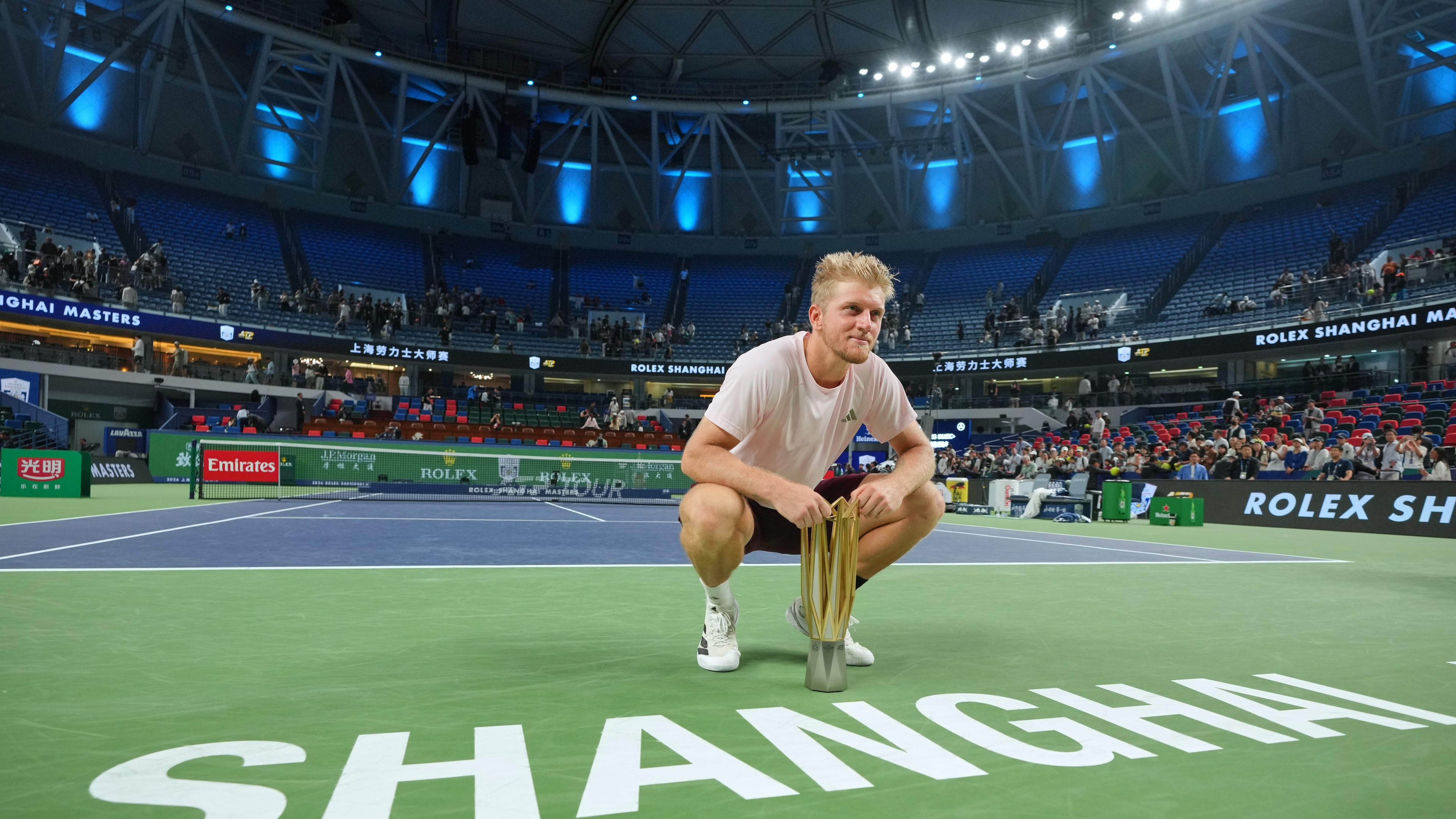 Spain's Alejandro Davidovich Fokina poses with the championship trophy after winning the men's singles final against Spain's Rafael Jodar at the Shanghai Masters tennis tournament in Shanghai, China, Sunday, Oct. 18, 2026. (AP Photo/Andy Wong)