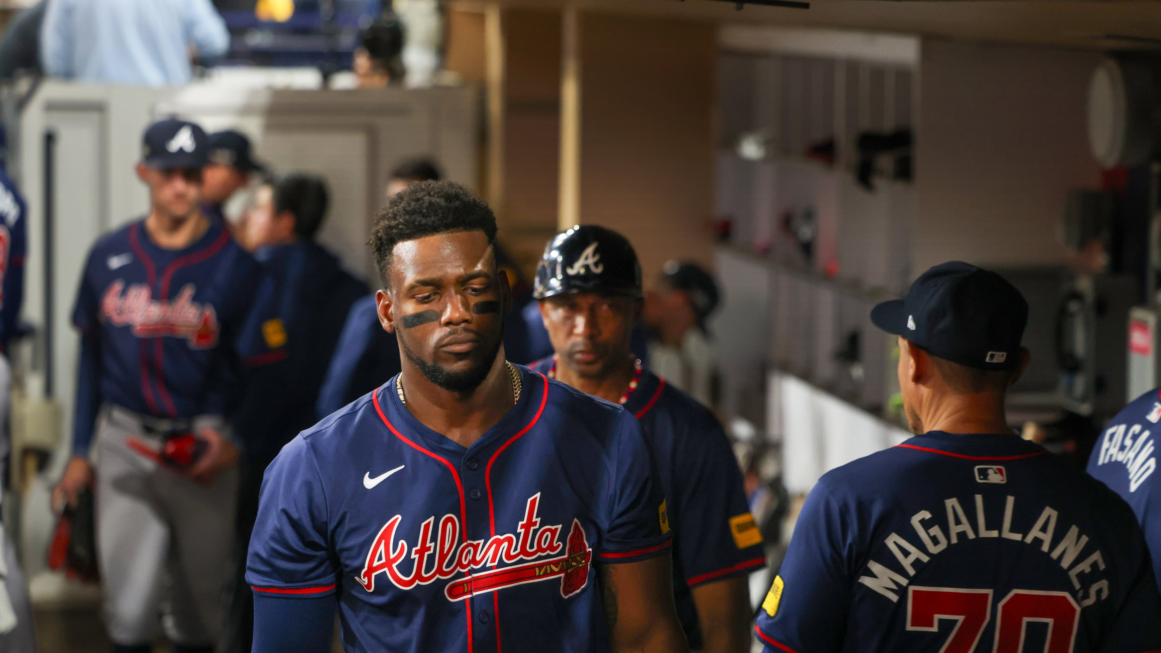 In this file photo from October 2024, Atlanta Braves outfielder Jorge Soler and teammates react after losing to the San Diego Padres 5-4 in San Diego. The Braves and Soler, who now plays for the Los Angeles Angels, face a lawsuit by a fan injured at a 2021 World Series game at Truist Park in Atlanta. (Jason Getz/AJC)
