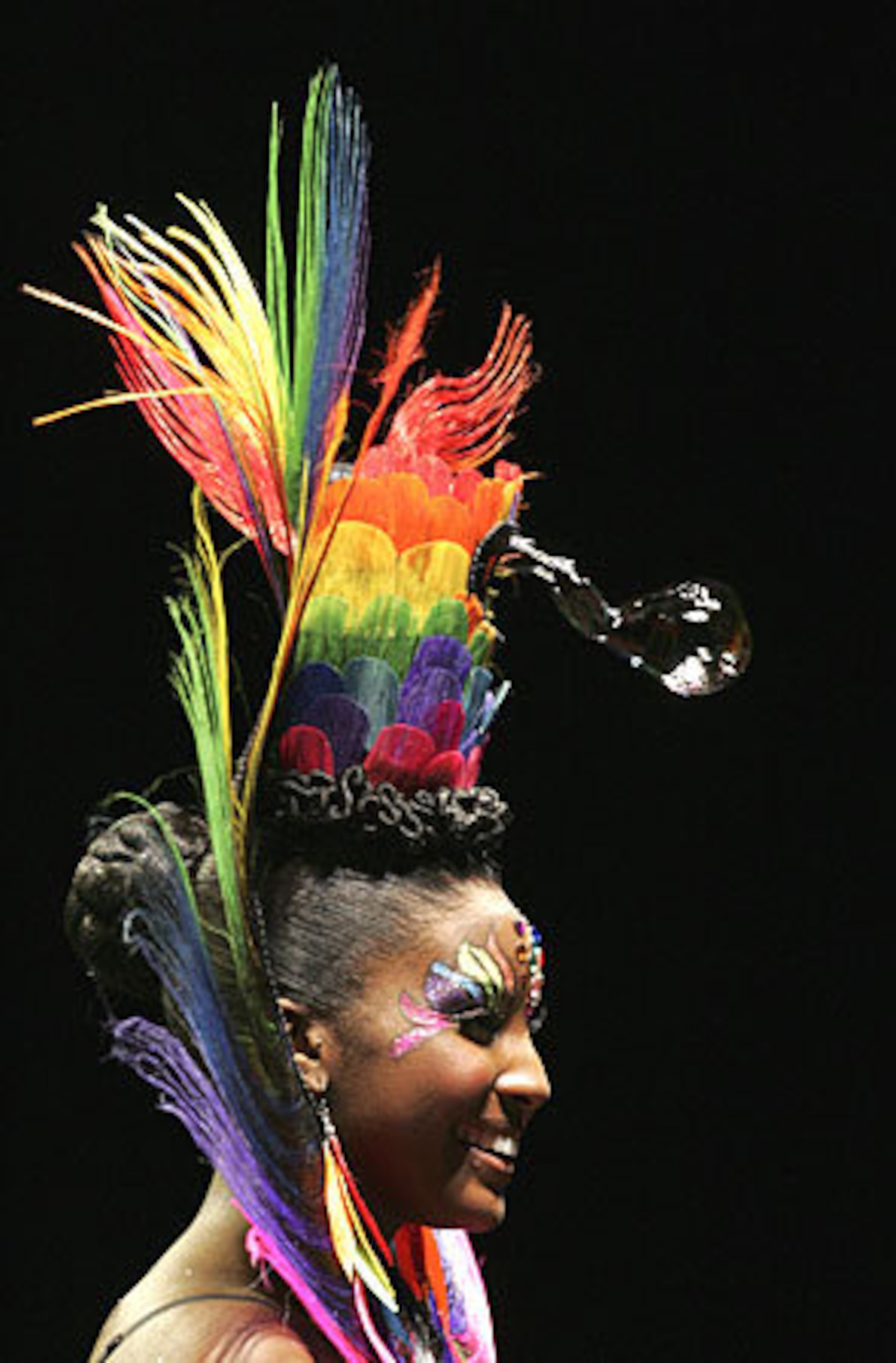 Bubbles blow out of a hair design of model Taneeka Hamilton by Stephanie Moye of Moye Hair Ect from Pittsburgh, Pa.