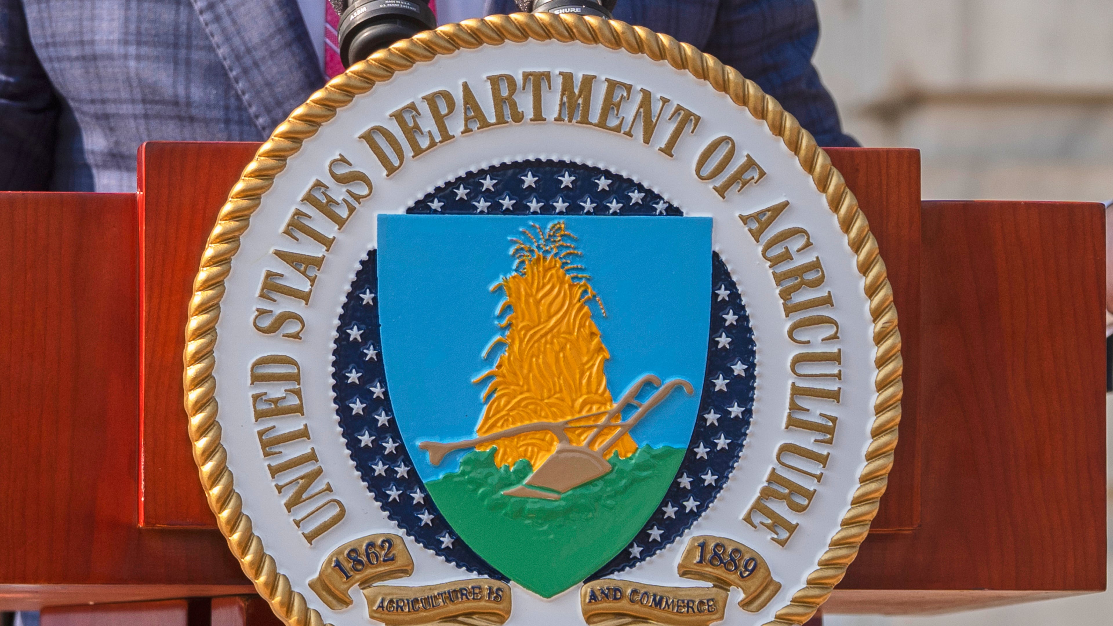 FILE - The U.S. Department of Agriculture seal is seen on a podium during a news conference in Washington on July 8, 2025. (AP Photo/Manuel Balce Ceneta, File)