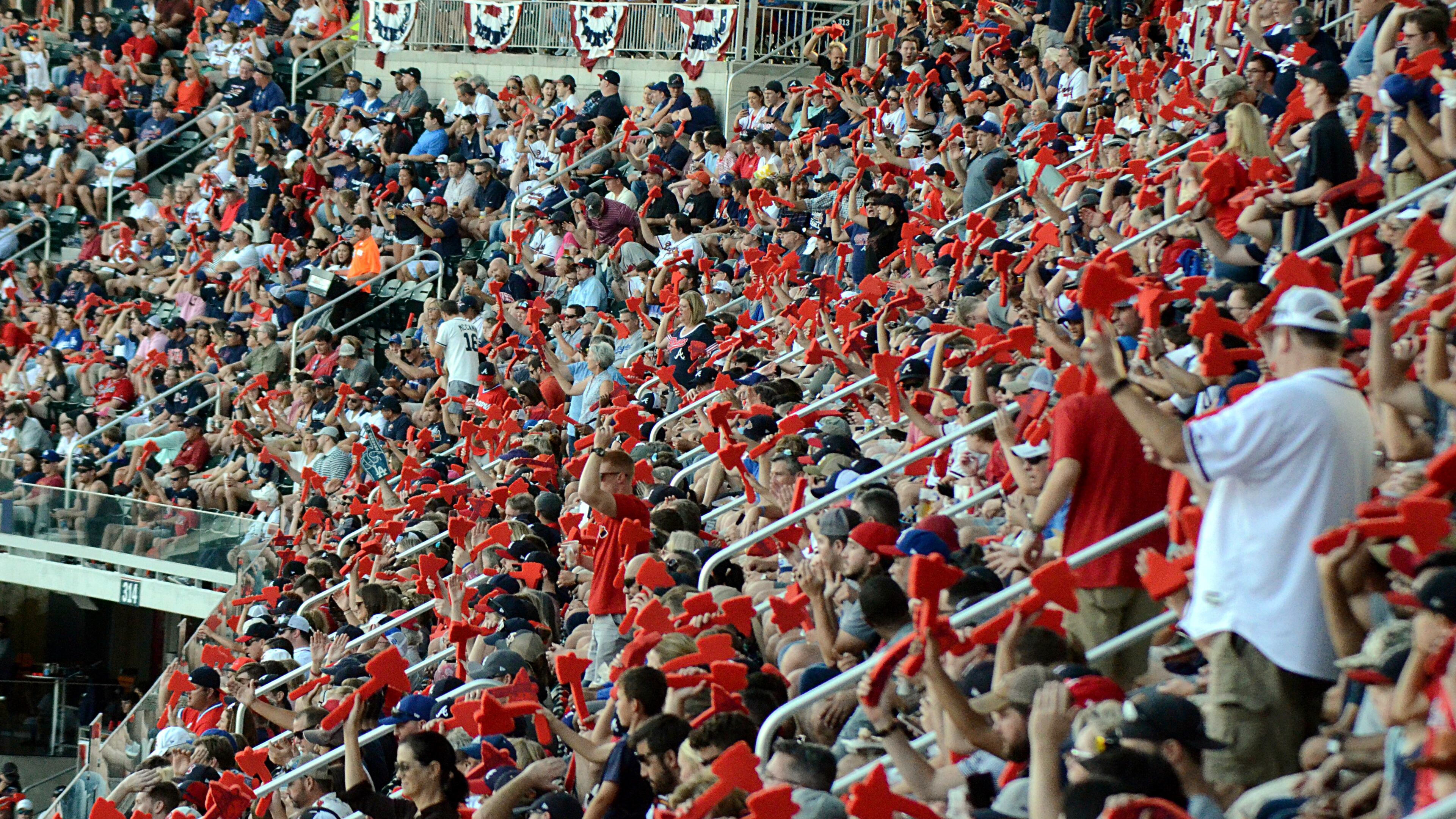 Atlanta Braves fans wave red styrofoam tomahawks in 2018.