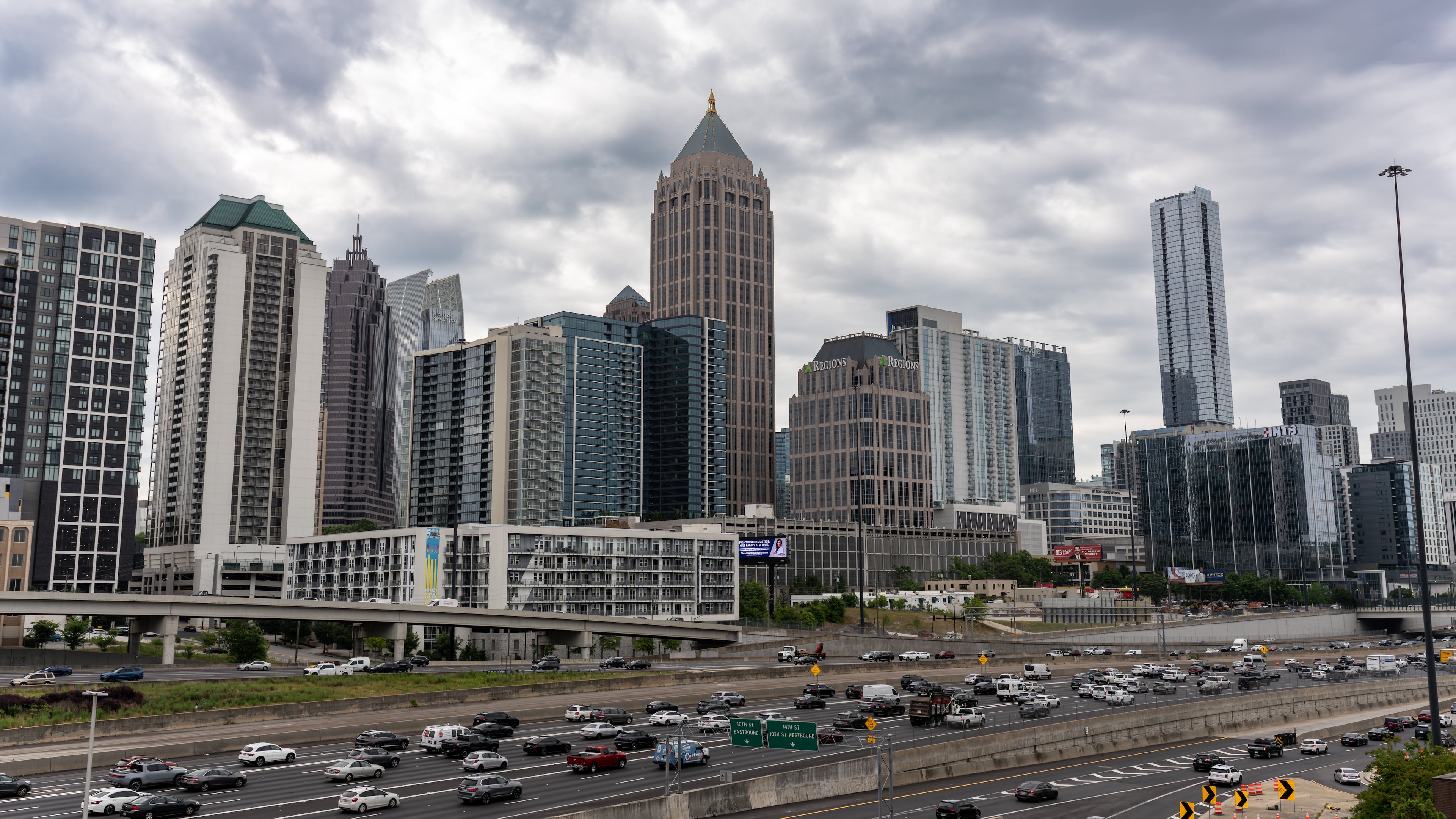 Rain clouds are expected to roll into Middle and North Georgia, as they did pictured here in Atlanta on May 6. The National Weather Service warns of “damaging winds, large hail, frequent lightning, and locally heavy rain" on Sunday afternoon and night. (Ben Hendren for the AJC)