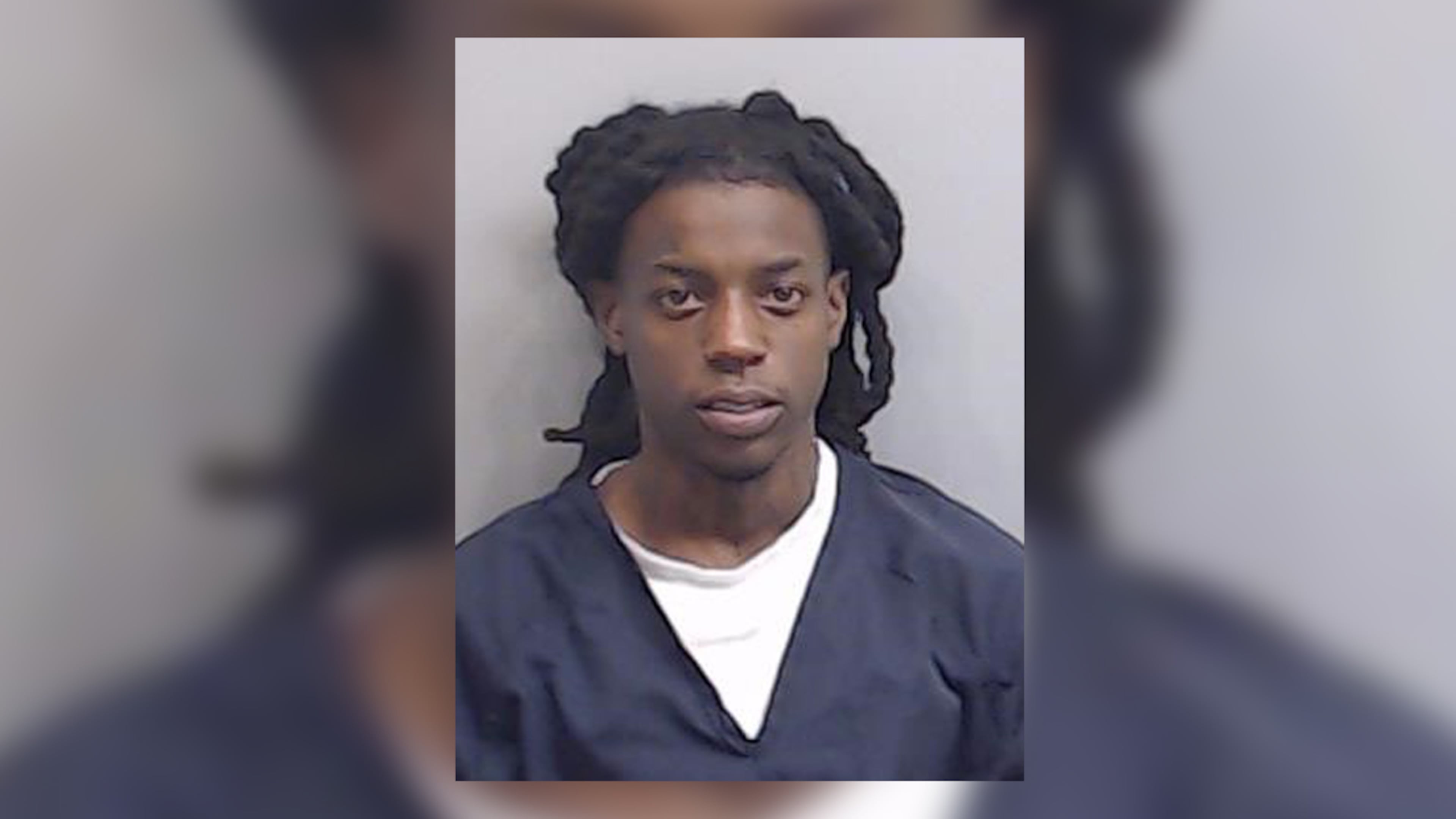 LeParis Dade, 24, also known as OMB Peezy, was booked into the Fulton County Jail on charges of aggravated assault with a deadly weapon and possession of a firearm during the commission of a crime.