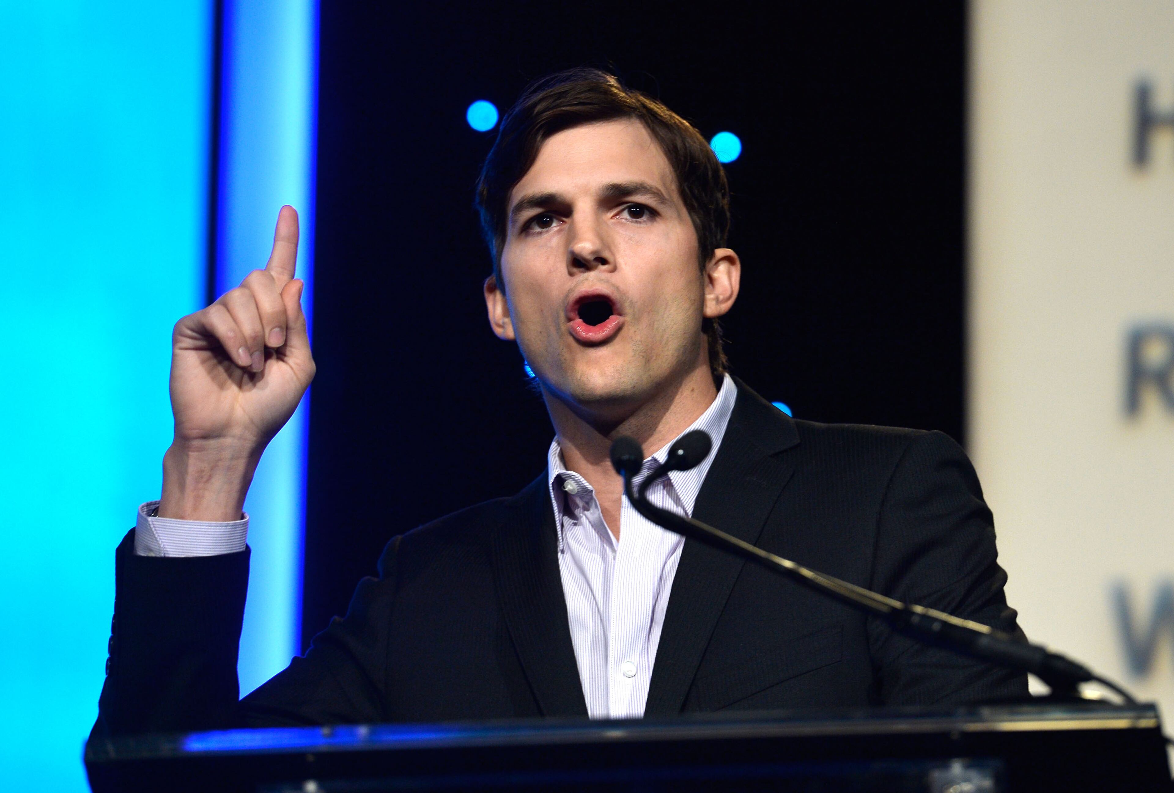 BEVERLY HILLS, CA - NOVEMBER 12: Actor Ashton Kutcher speaks at the Human Rights Watch Voices For Justice Dinner at The Beverly Hilton Hotel on November 12, 2013 in Beverly Hills, California. (Photo by Frazer Harrison/Getty Images)