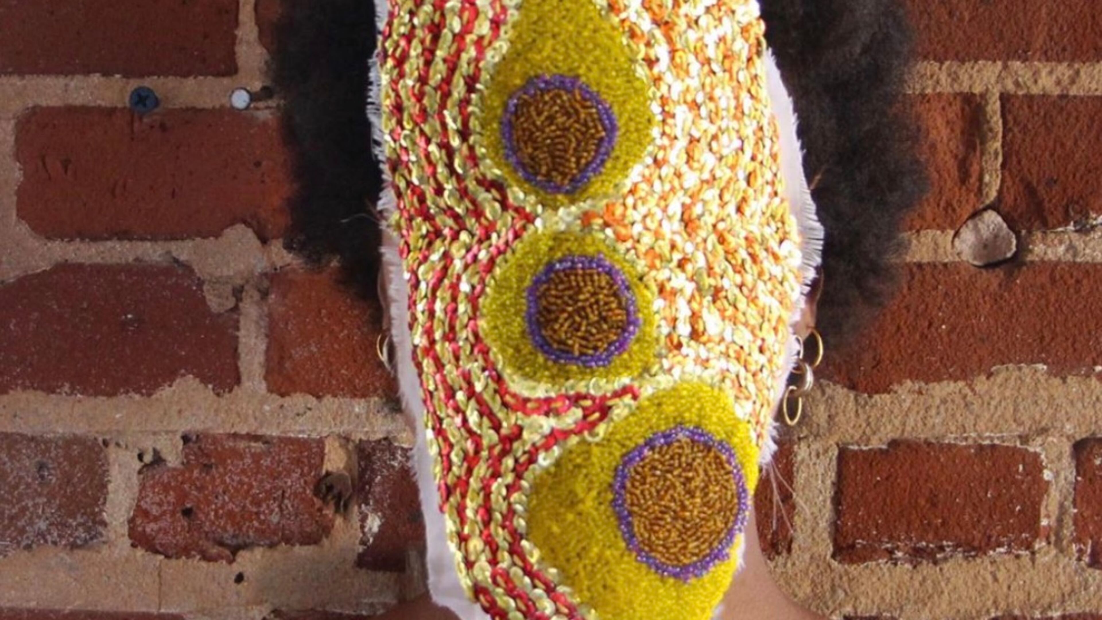 Atlanta artist and Spelman professor Kelly Talyor Mitchell created this mask as part of a performance series she created. She's one of MOCA GA's new fellows in the museum's Working Artist Project. Contributed.