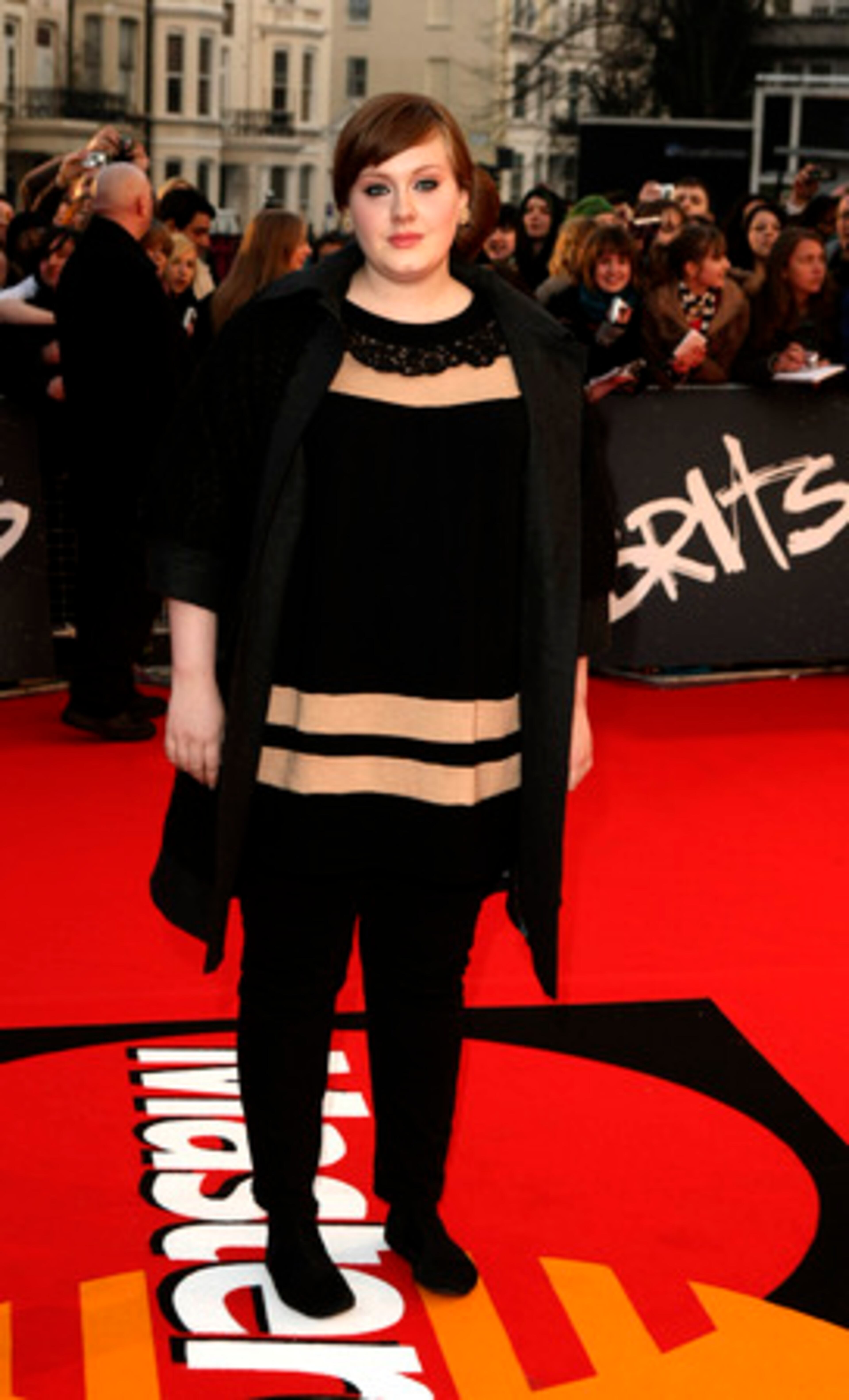 Singer Adele of "Chasing Pavements" fame arrives.