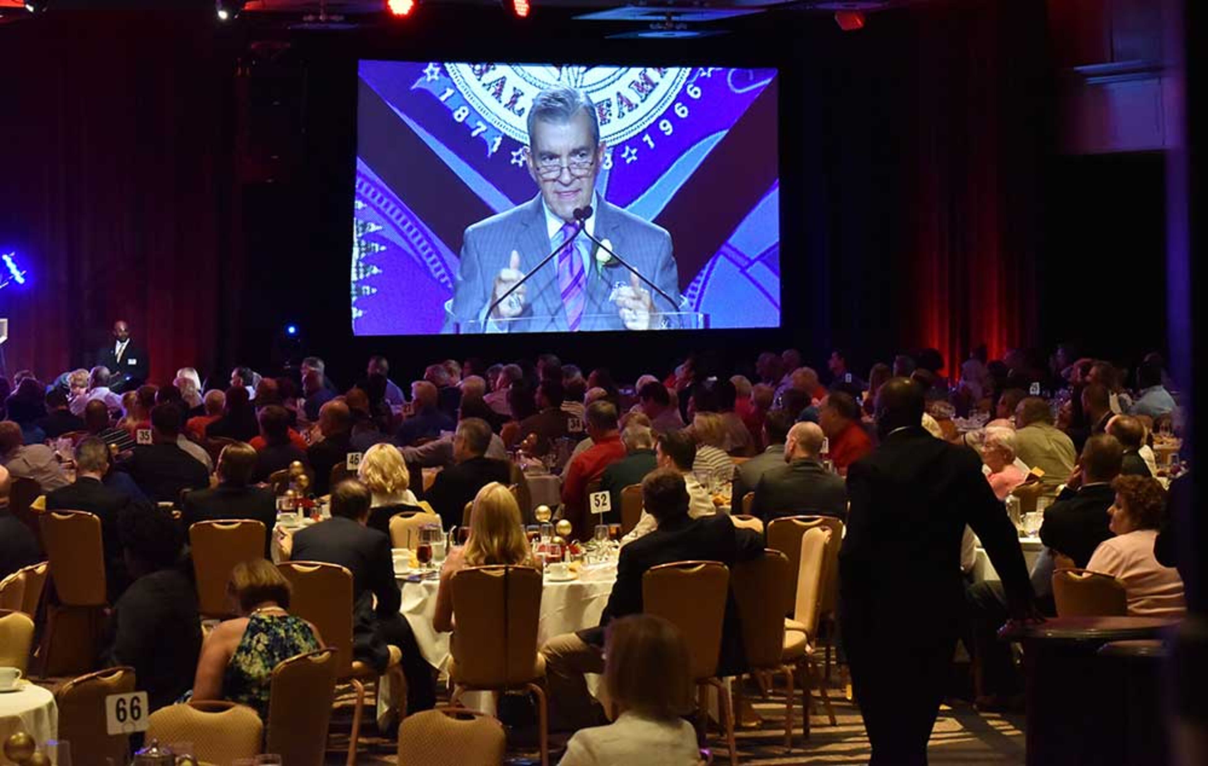 Atlanta Braves President John Schuerholz gives his acceptance speech during Braves Hall of Fame luncheon at Hyatt Regency on Friday, August 19, 2016. Atlanta Braves President John Schuerholz and former outfielder Andruw Jones were inducted into the Braves Hall of Fame. The duo were inducted during a luncheon and honored that evening in a pregame ceremony before the Braves play the Washington Nationals.