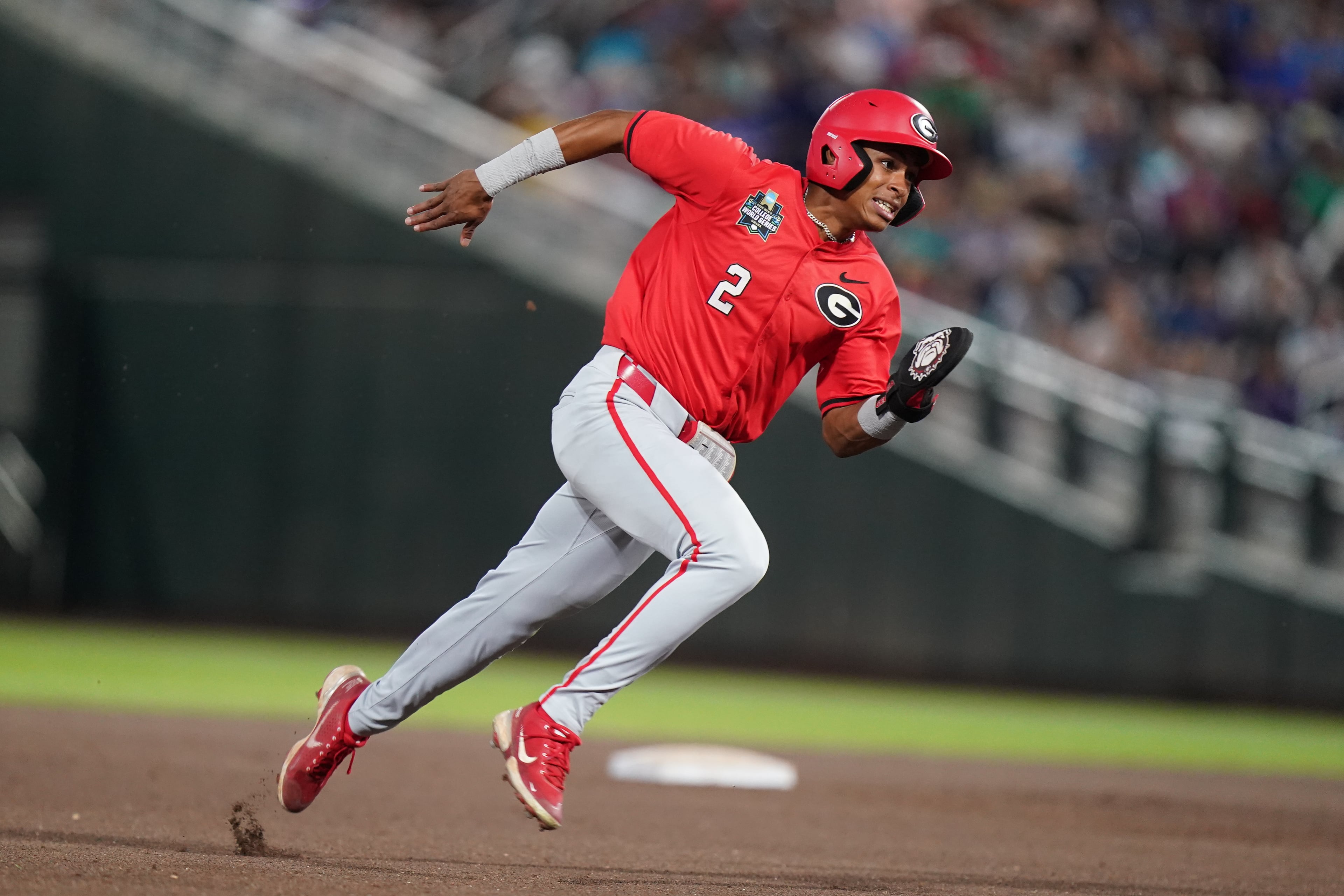 Georgia infielder Ryan Black (2) rounds second in the seventh inning during an NCAA baseball College World Series elimination game against Texas, Tuesday, June 16, 2026 in Omaha, Neb. Georgia won 2-0. (AP Photo/Vera Nieuwenhuis)