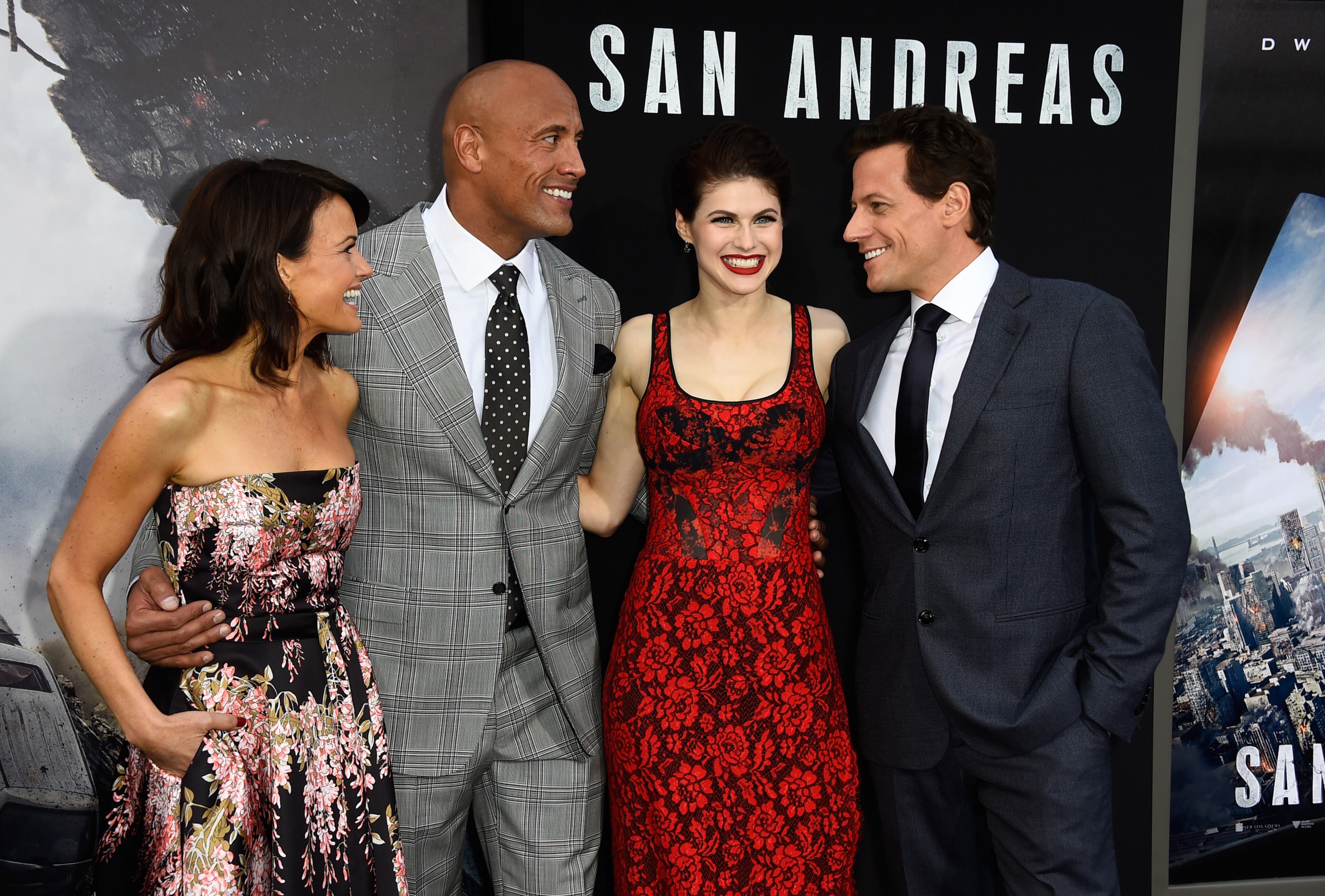 HOLLYWOOD, CA - MAY 26: (L-R) Actors Carla Gugino, Dwayne 'The Rock' Johnson, Alexandra Daddario and Ioan Gruffudd attend the premiere of Warner Bros. Pictures' "San Andreas" at the TCL Chinese Theatre on May 26, 2015 in Hollywood, California. (Photo by Frazer Harrison/Getty Images)