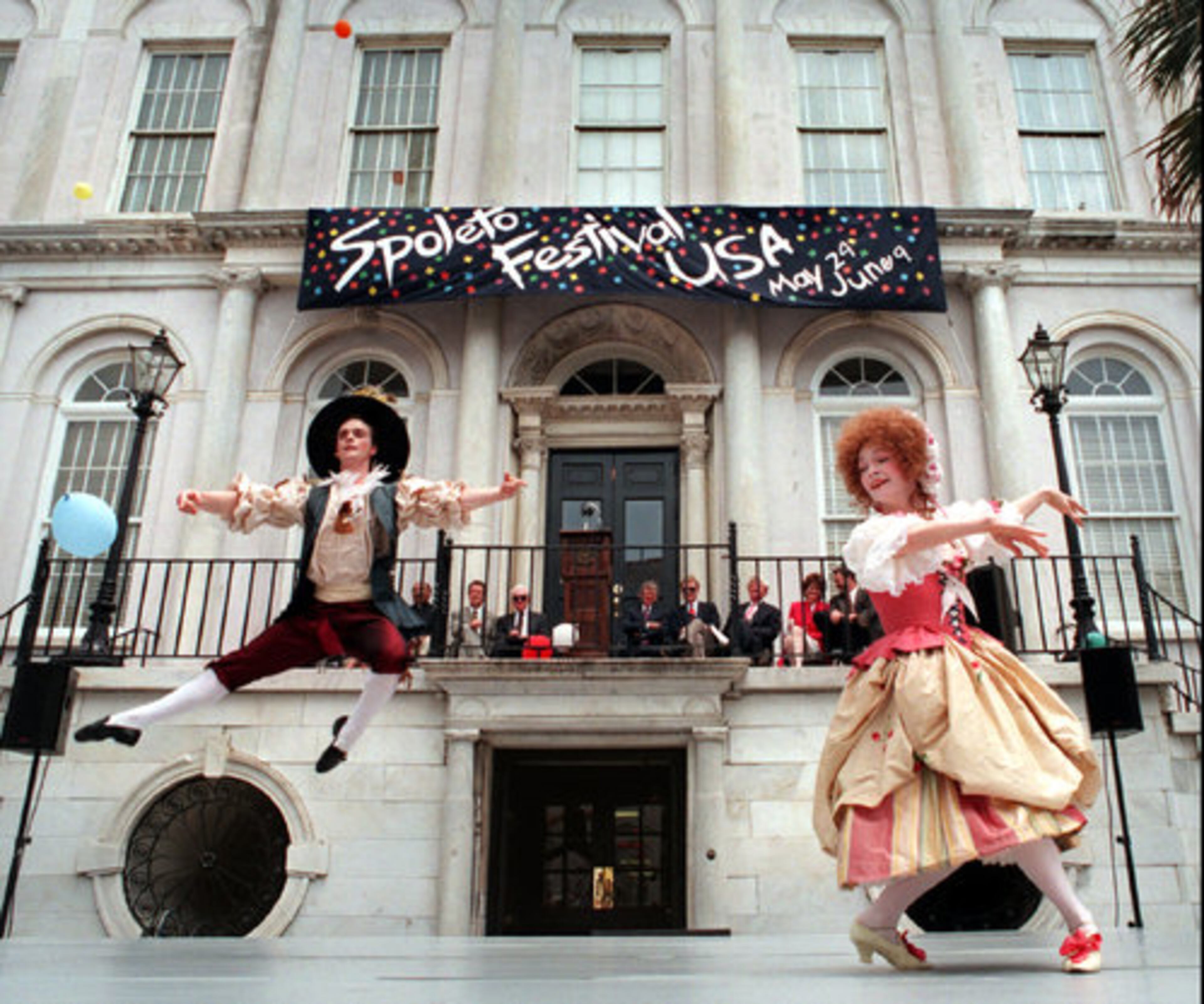 Peter Parker (left) and Sandrine Moreau of the Ballet du Rhin dance in front of Charleston, S.C. City Hall during the opening ceremony of the Spoleto Festival USA, 1996.