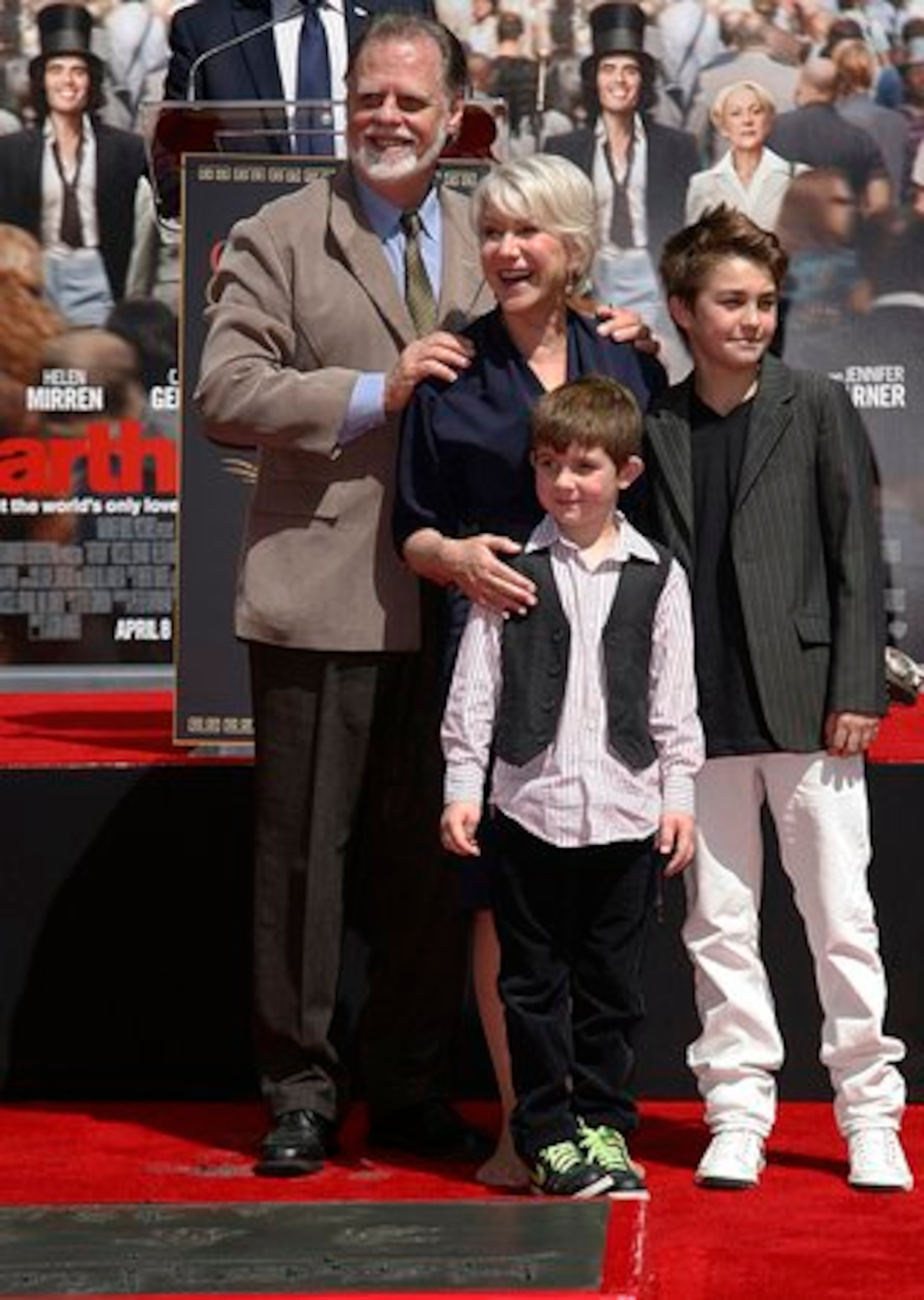 Actress Helen Mirren and husband, movie director Taylor Hackford pose with their grandnephews Felix and Cameron Mirren, right, after the ceremony.