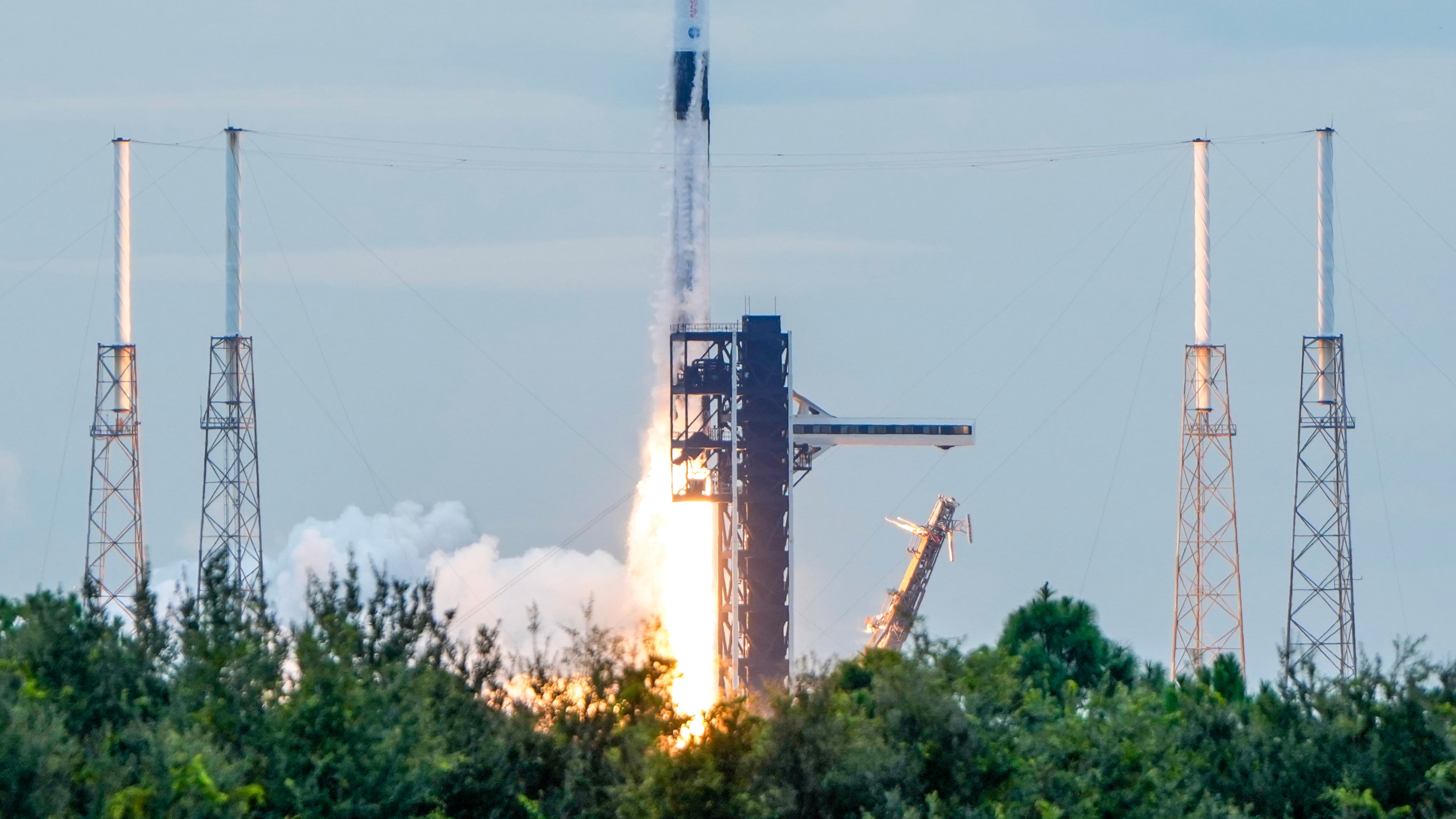 A SpaceX Falcon 9 rocket with a crew of four launches from pad 40 at the Cape Canaveral Space Force Station in Cape Canaveral, Fla., Thursday, Oct. 1, 2026. (AP Photo/John Raoux)