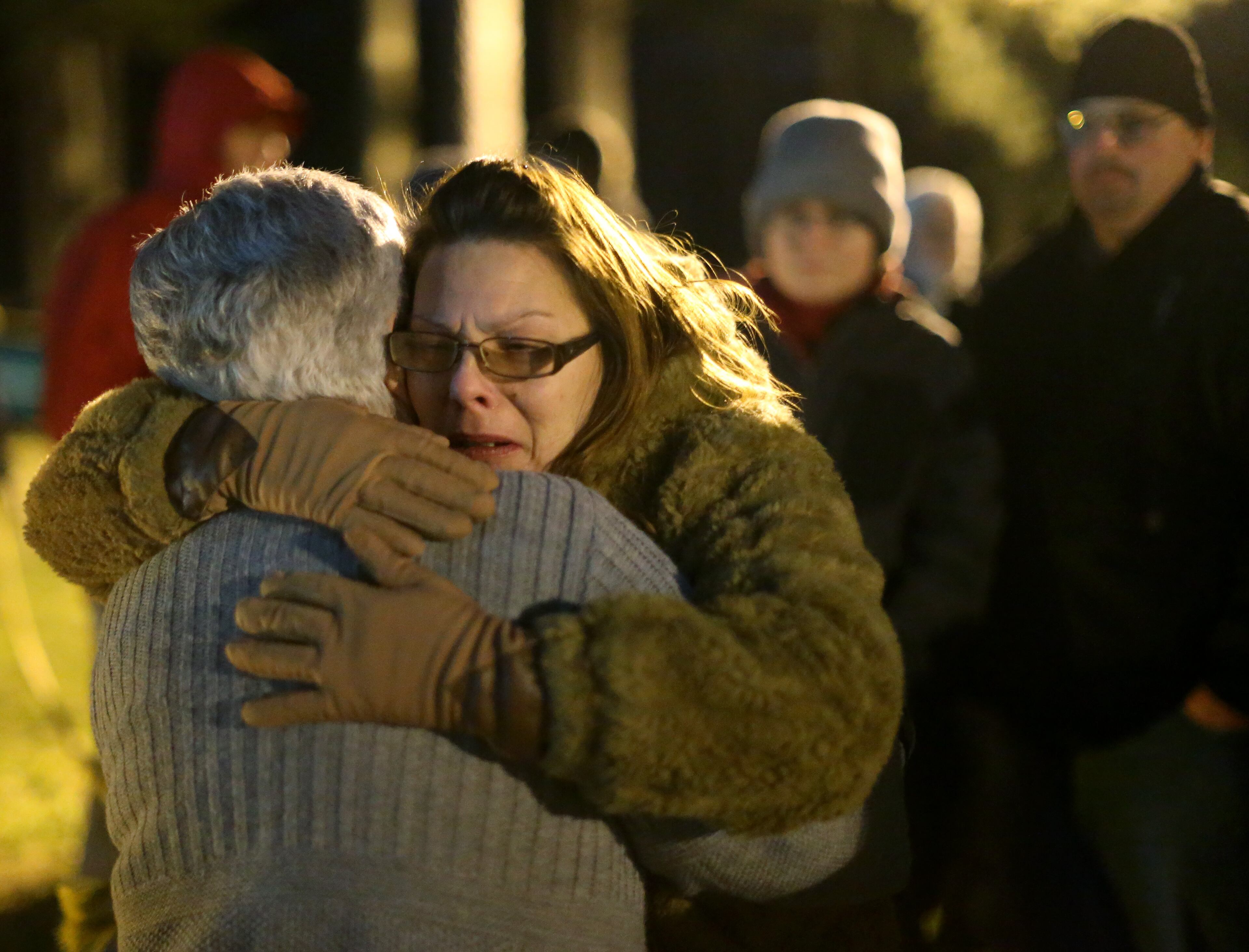 Anita Hunt, facing, a family friend of Travis Clinton Hittson, hugs Travis' mom, Pat Hittson. Hittson witnessed her son's execution Wednesday evening at the Georgia Diagnostic and Classification Prison in Jackson. Ben Gray / bgray@ajc.com