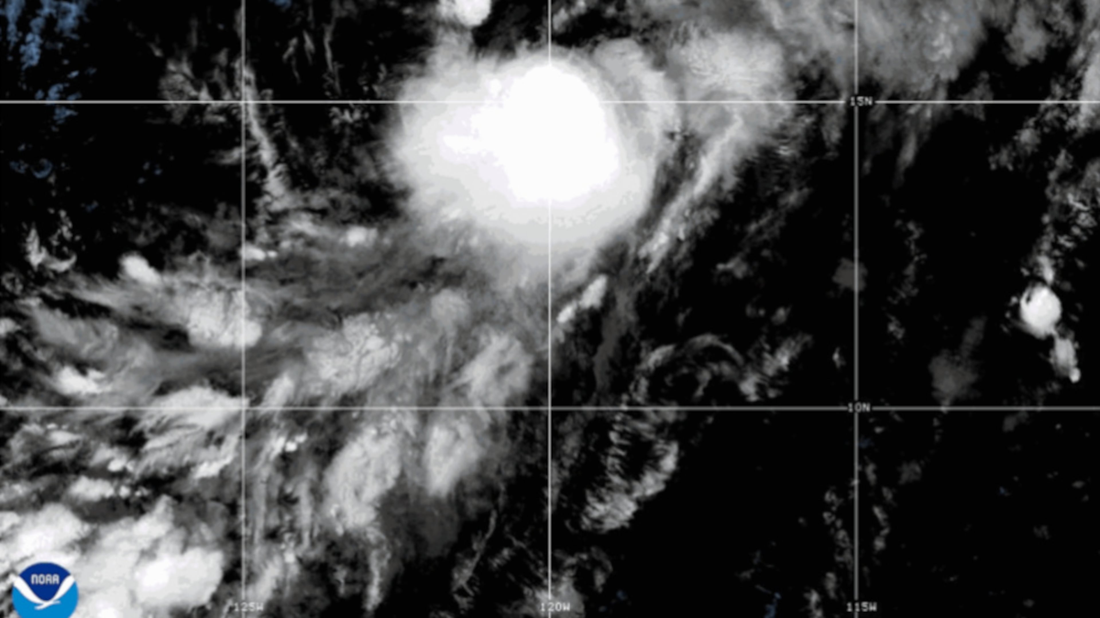 This satellite image released by NOAA shows the Tropical Storms Iselle, top, and Julio, bottom, over the Pacific Ocean, Tuesday, Aug. 25, 2026. (NOAA via AP)