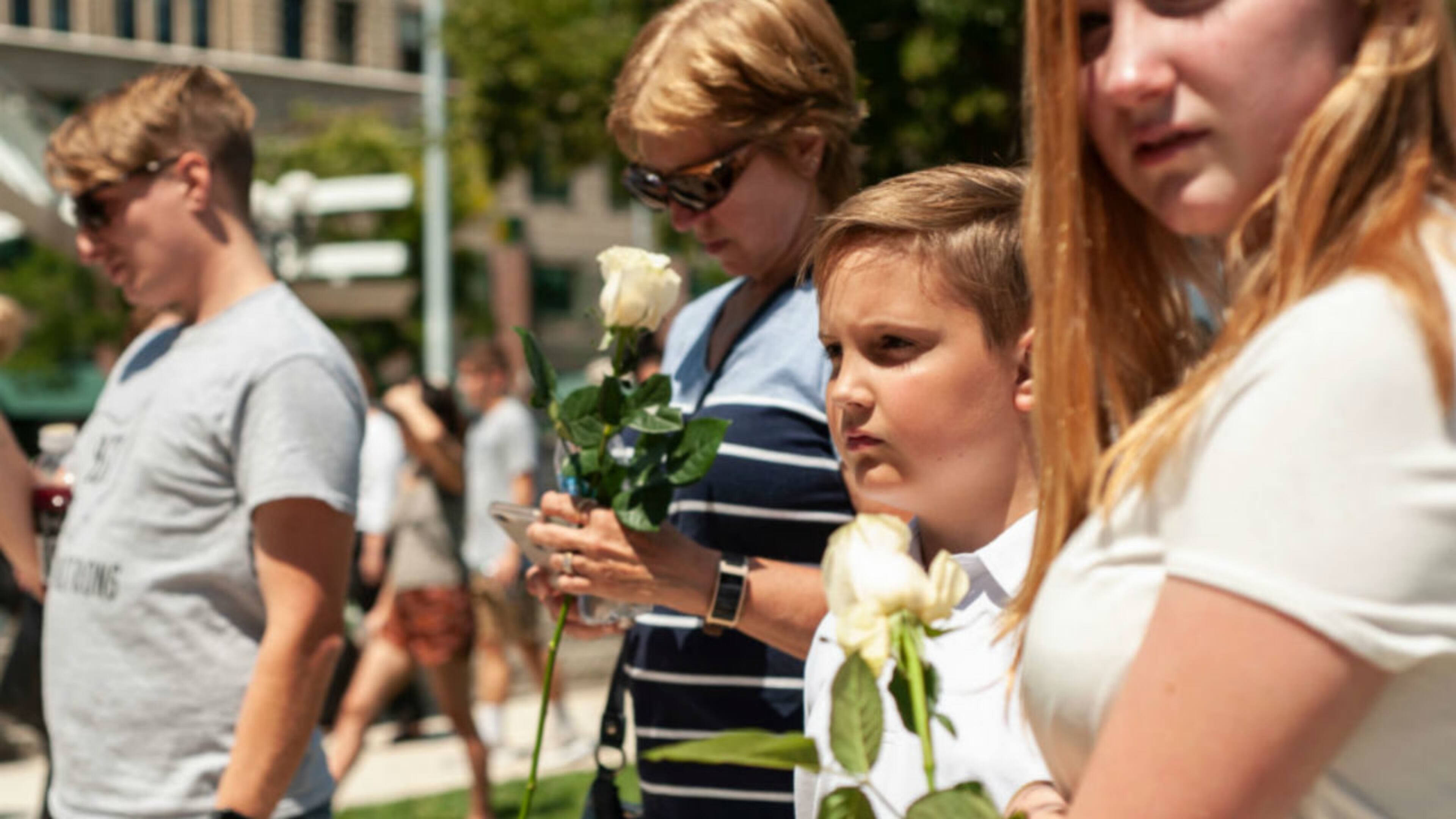 People gather for a vigil at the Levitt Pavilion for the victims of the mass shooting that occurred early Sunday morning in Dayton, Ohio. (Photo by Matthew Hatcher/Getty Images)