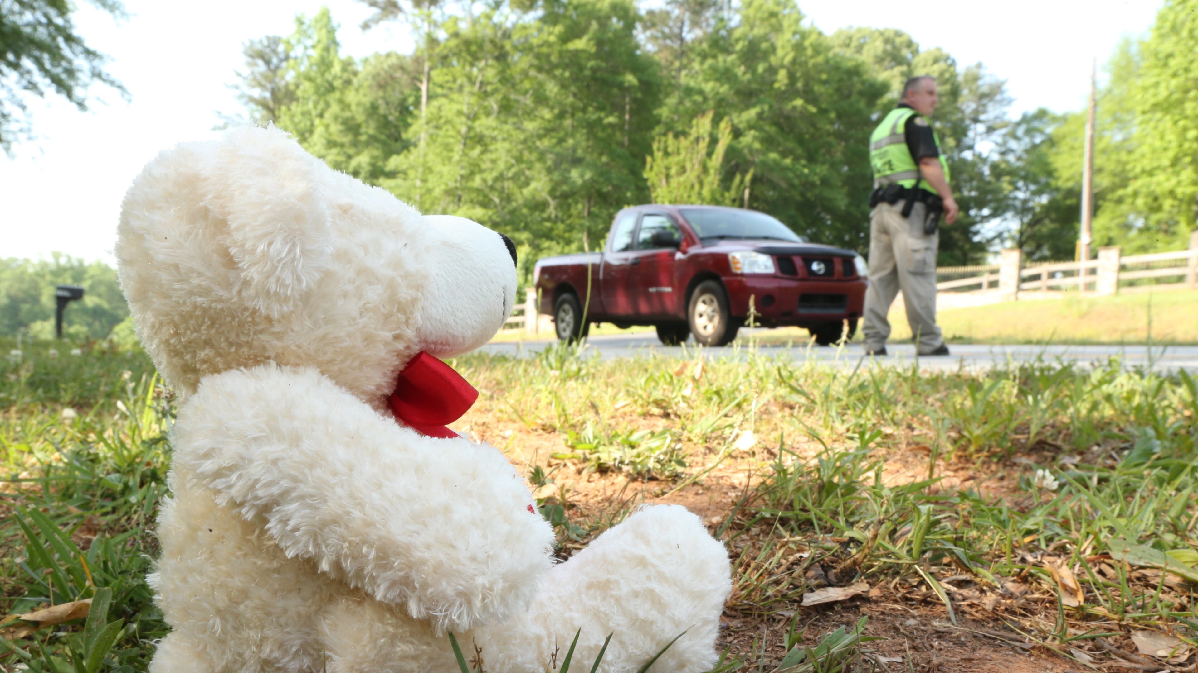 A teddy bear sits in memory of a girl, 16, killed Wednesday in a Henry County wreck.