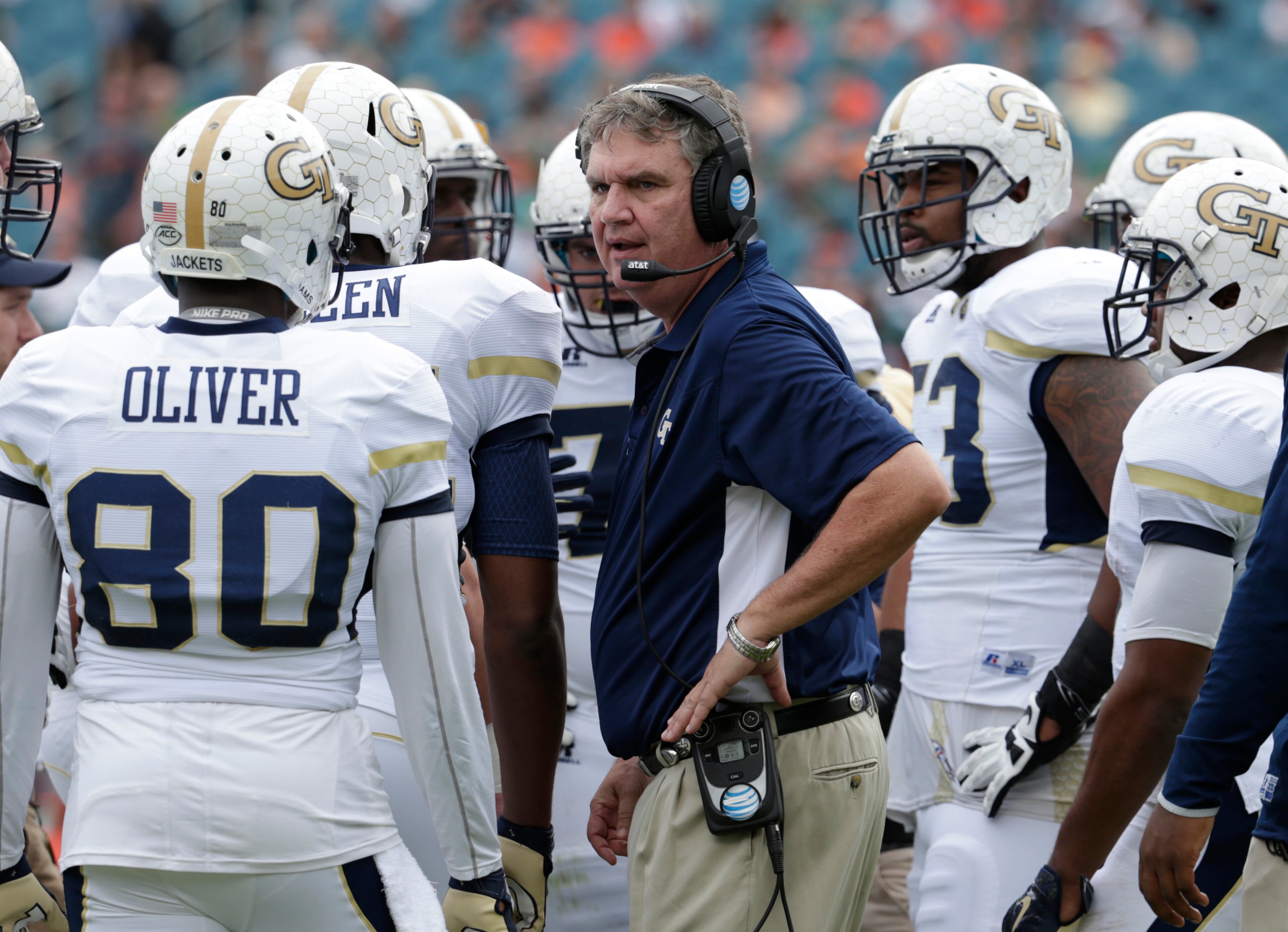 Georgia Tech head coach Paul Johnson talks with his players during the first half of an NCAA college football game against Miami, Saturday, Nov. 21, 2015 in Miami Gardens, Fla. (AP Photo/Lynne Sladky)