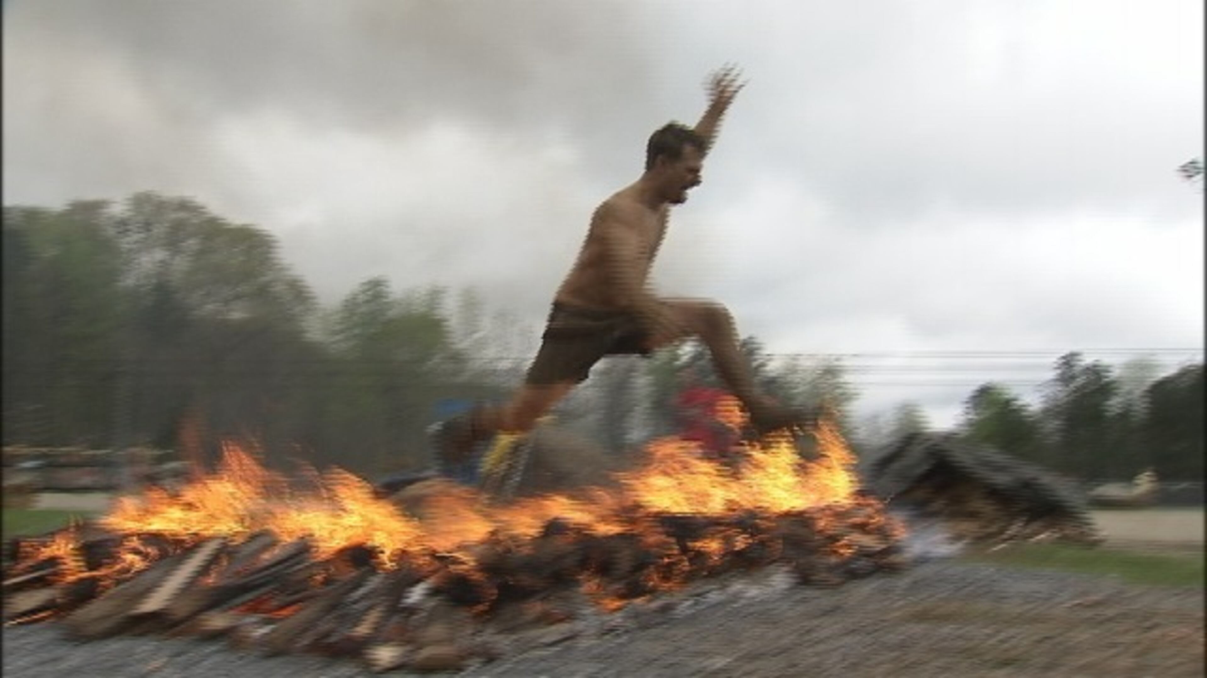 Runners battled mud, fire and barbed wire to compete in the Spartan Race at the National Whitewater Center in Charlotte.