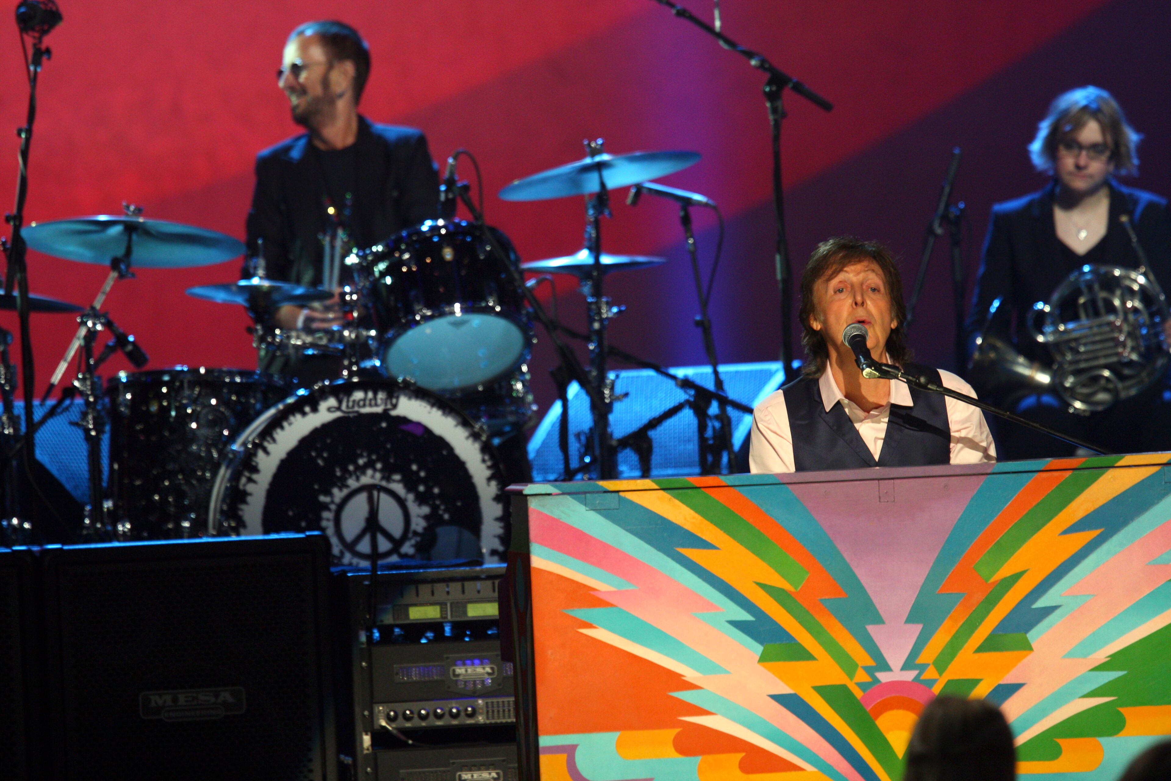 Paul McCartney and Ringo Starr perform at The Night that Changed America: A Grammy Salute to the Beatles, on Monday, Jan. 27, 2014, in Los Angeles. (Photo by Zach Cordner/Invision/AP)