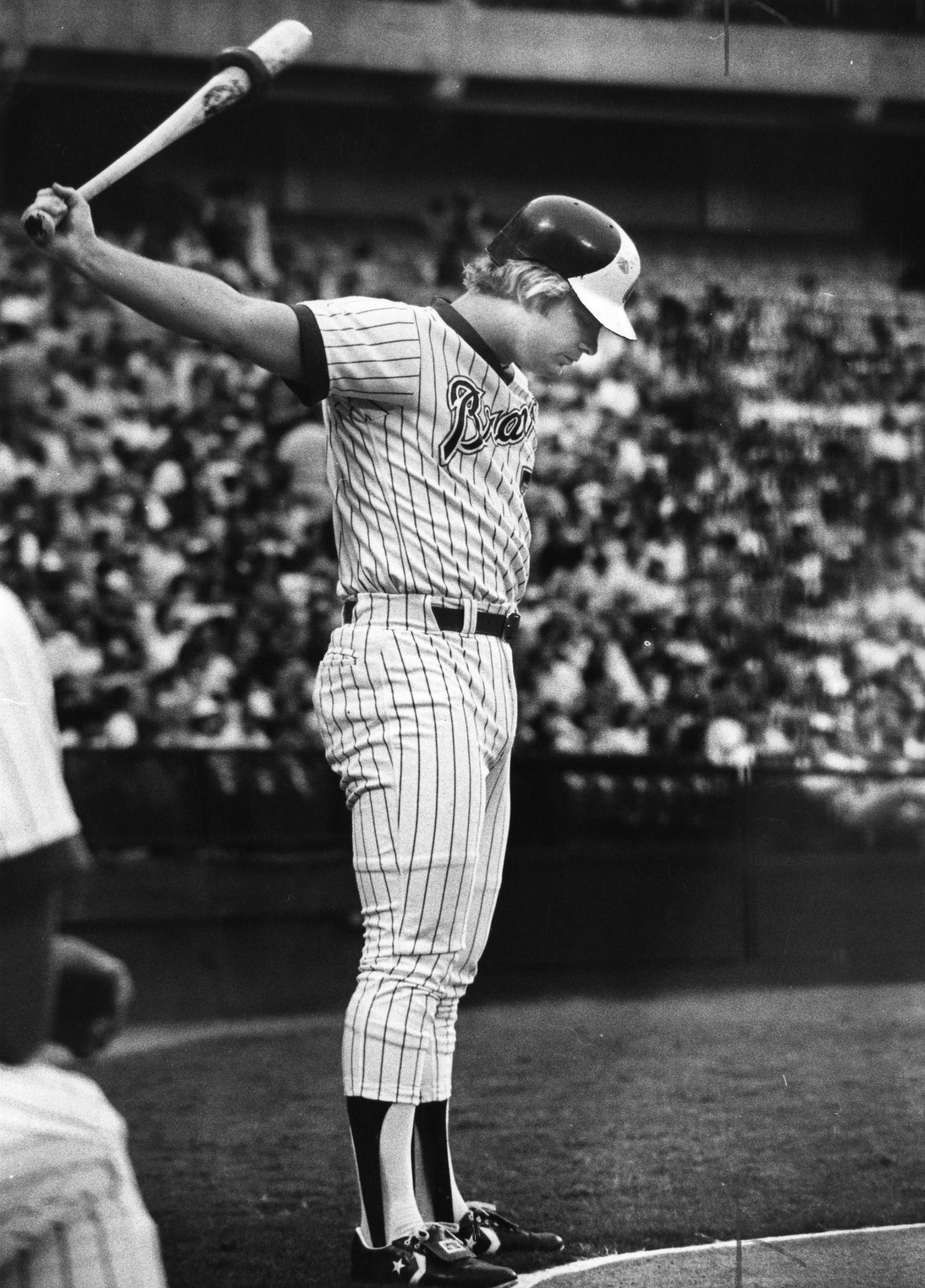 Horner gets loose before batting in 1980. AJC file photo