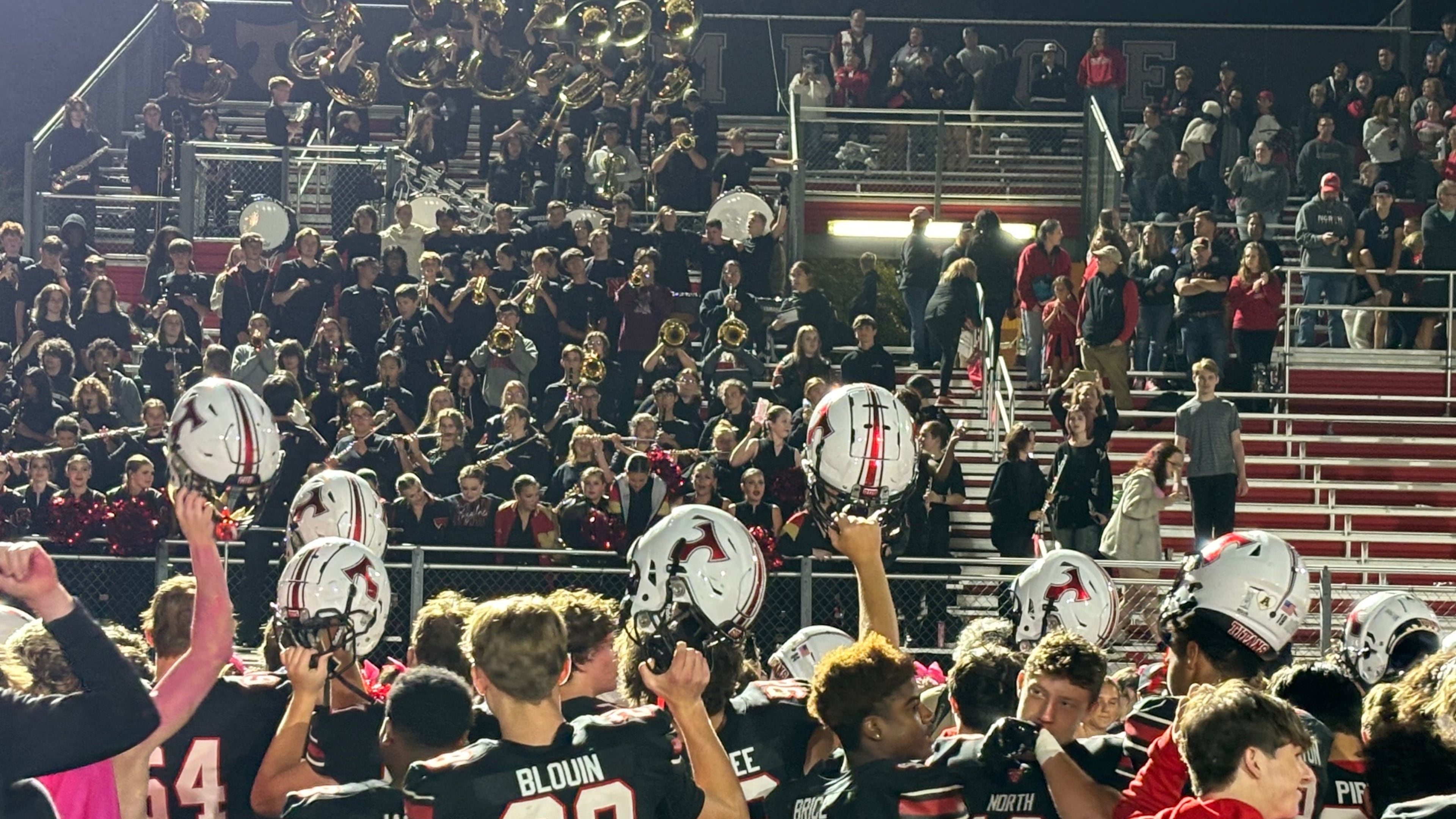 North Oconee players celebrate their 40-35 win over Eastside on Oct. 12, 2024.