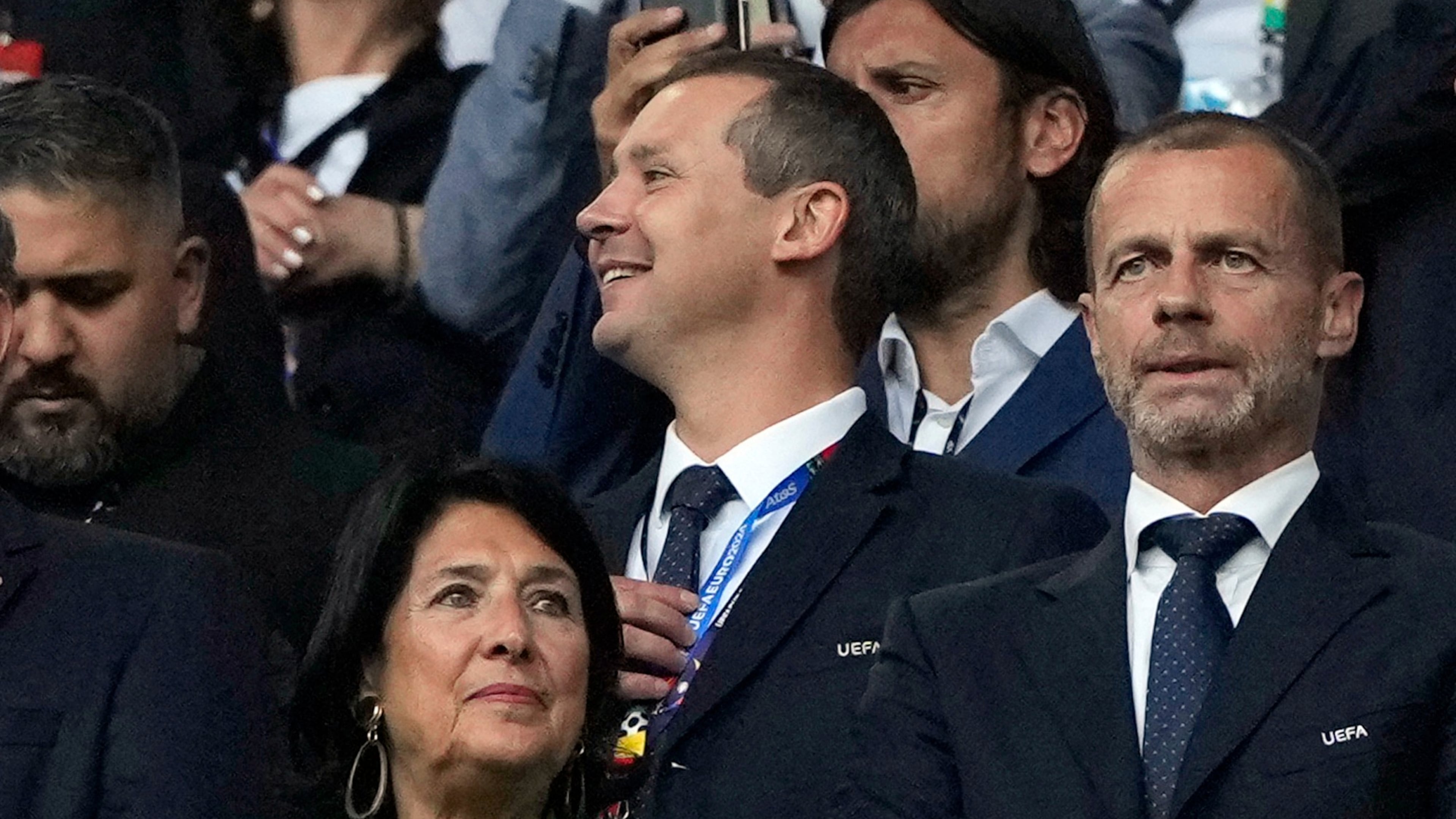FILE - UEFA's deputy general secretary Kevin Lamour, centre, looks on as he stands next to UEFA President Aleksander Ceferin, right, prior to the start of a Group F match between Turkey and Georgia at the Euro 2024 soccer tournament in Dortmund, Germany, Tuesday, June 18, 2024. K(AP Photo/Alessandra Tarantino, File)