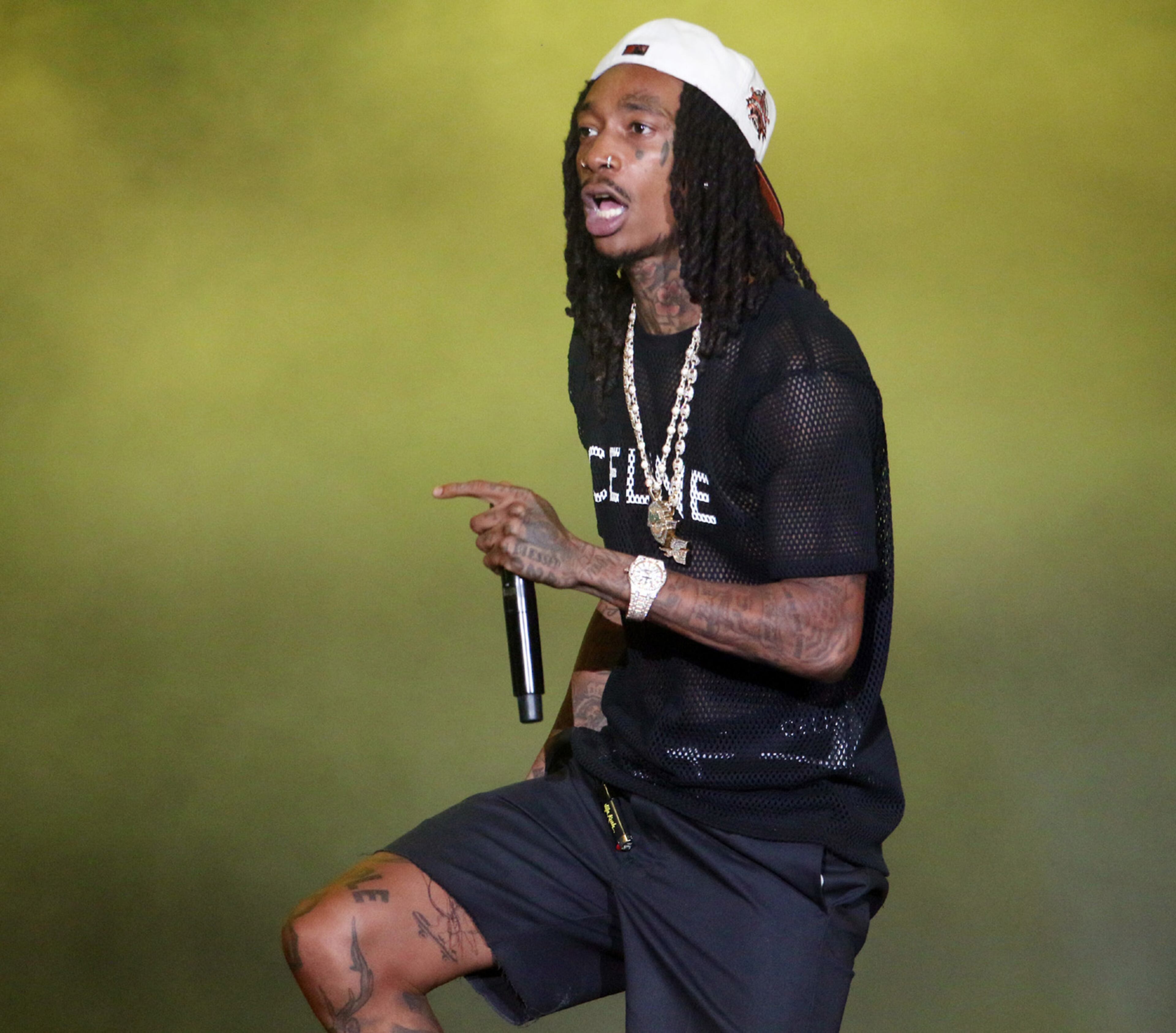 Wiz Khalifa performs as Snoop Dogg brought his High School Reunion Tour to Lakewood Amphitheatre on Wednesday, August 9, 2023. Additional acts included Wiz Khalifa, Too $hort, Warren G, Berner and DJ Drama. Robb Cohen for the Atlanta Journal-Constitution