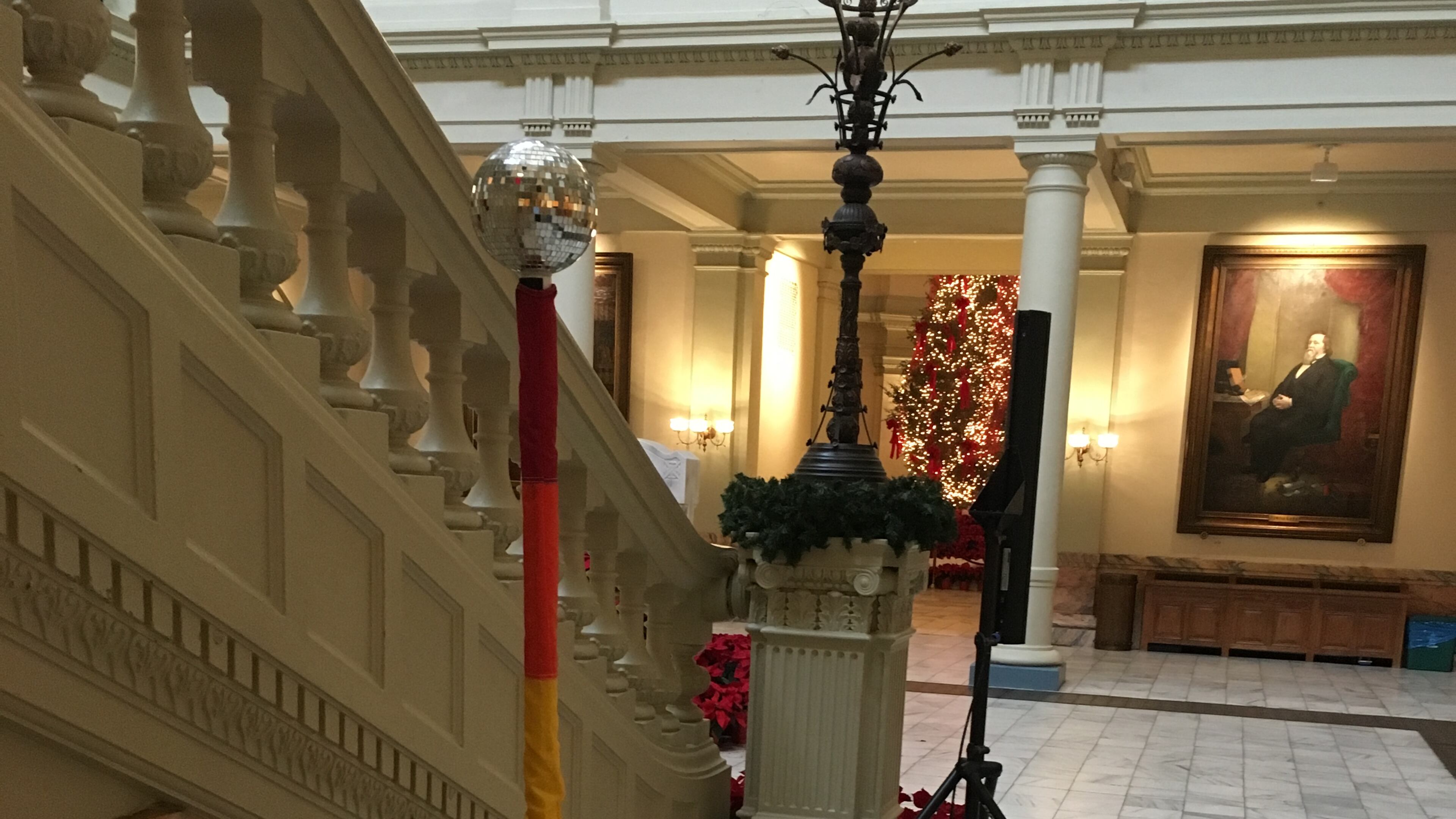A Gay Pride Festivus Pole stands vigil in the Georgia Capitol