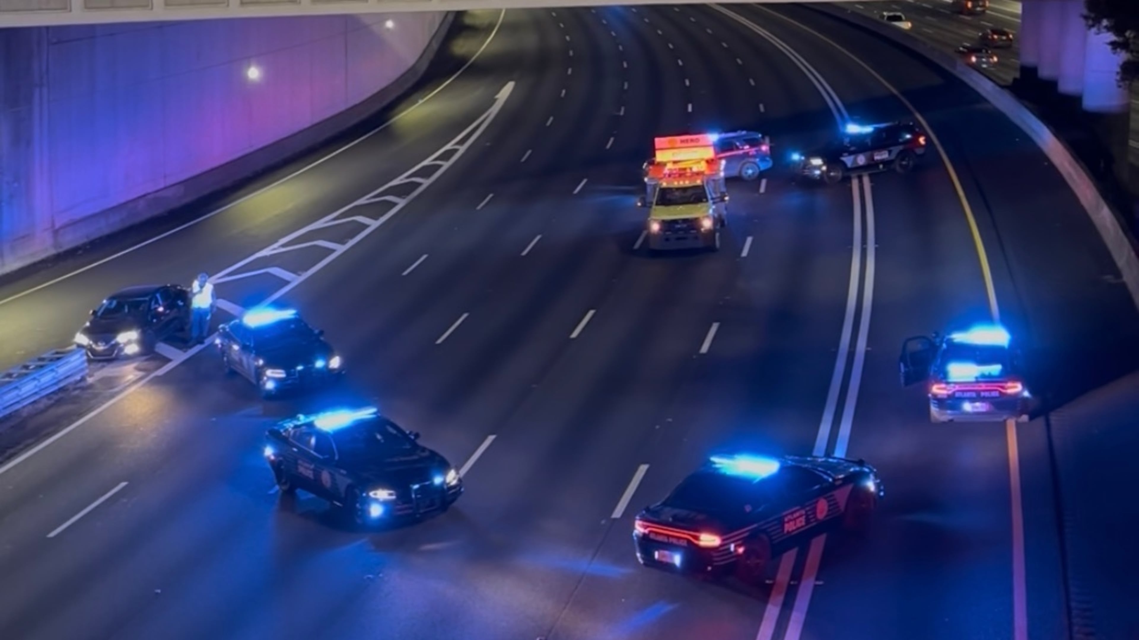 Atlanta police and a Georgia Department of Transportation HERO unit shut down I-75/I-85 North at Spring Street after a person was hit and killed early Thursday, Aug. 27, 2026. (Doug Turnbull for the AJC)