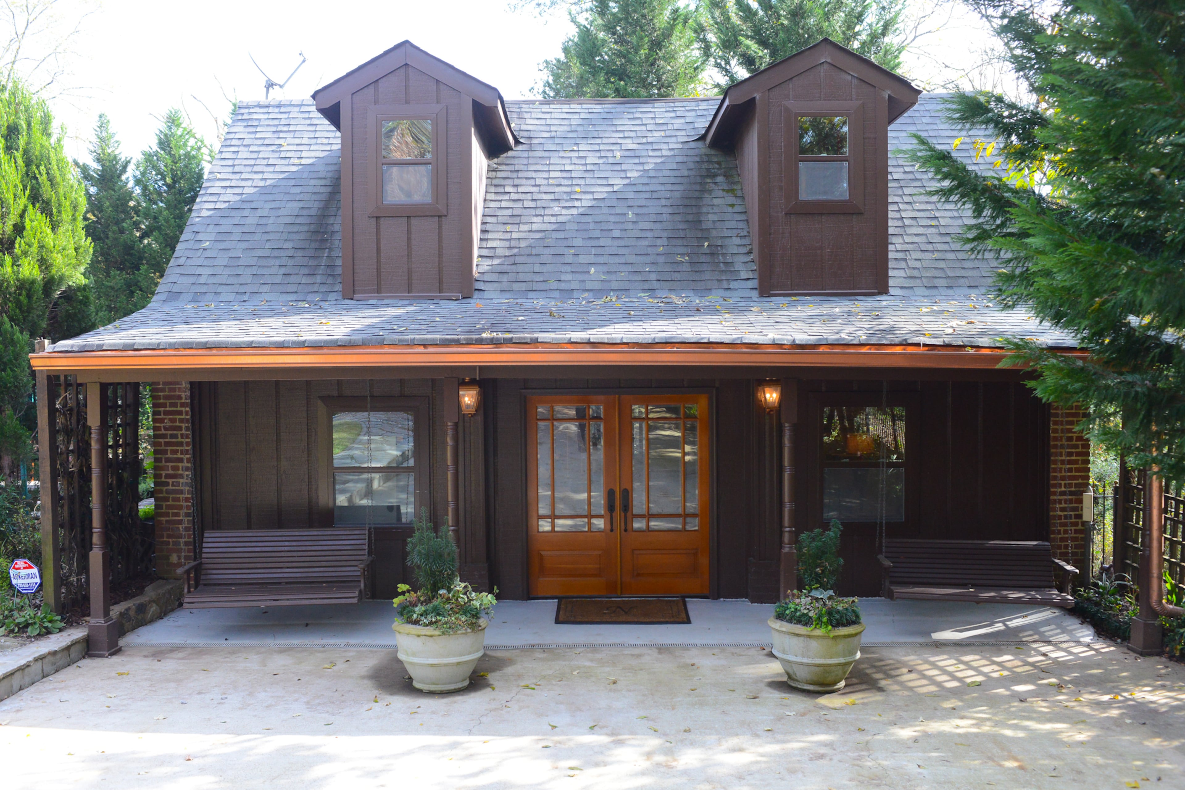 Toward the back of Danielle and Keenan Nix's East Lake 1.4-acre property sits a renovated carriage house, which now offers guests a quiet "bed and breakfast" retreat complete with a bedroom suite, kitchen and living area.