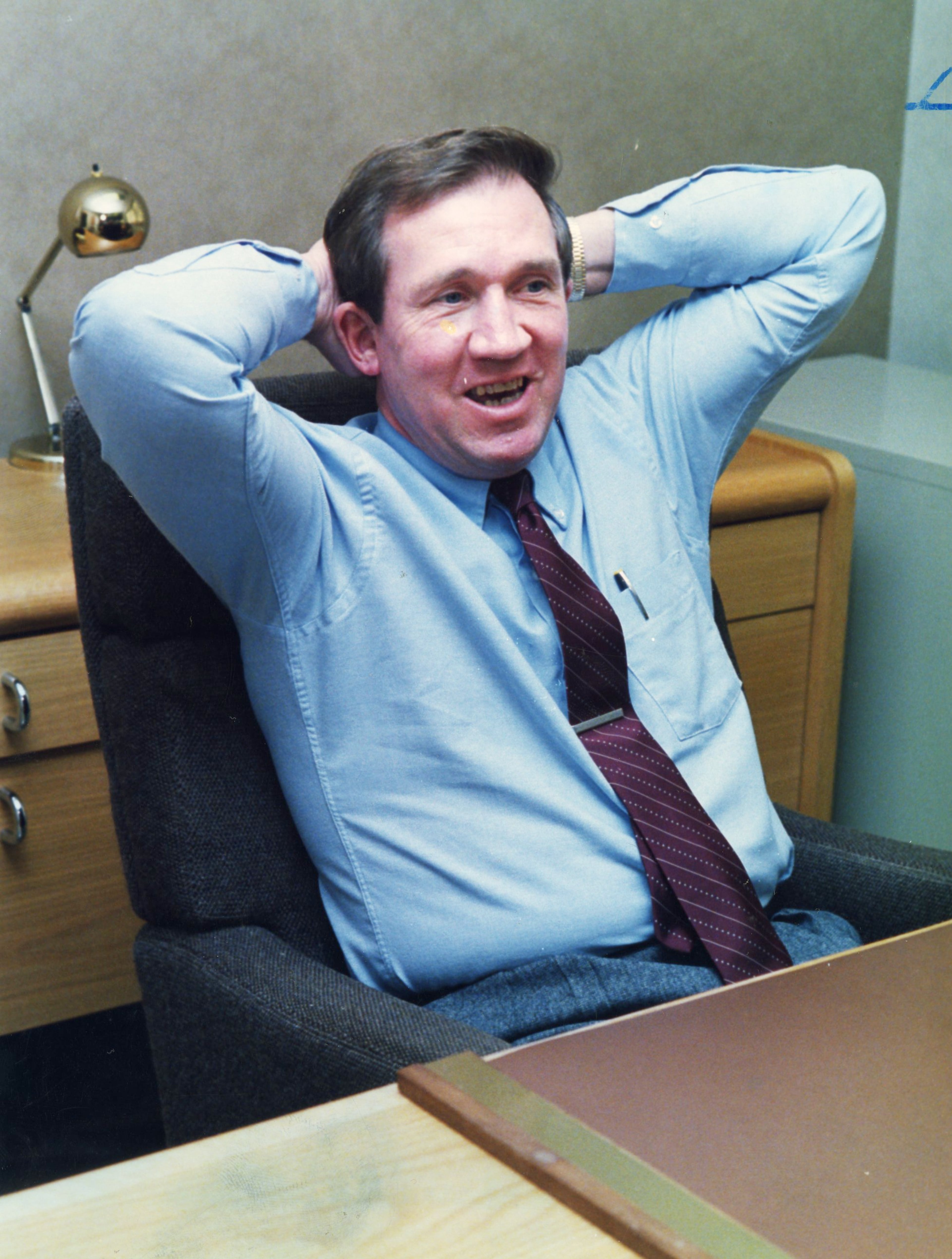 Bobby Ross tries out his new office after being named Tech's coach in 1987. Steve Deal / AJC