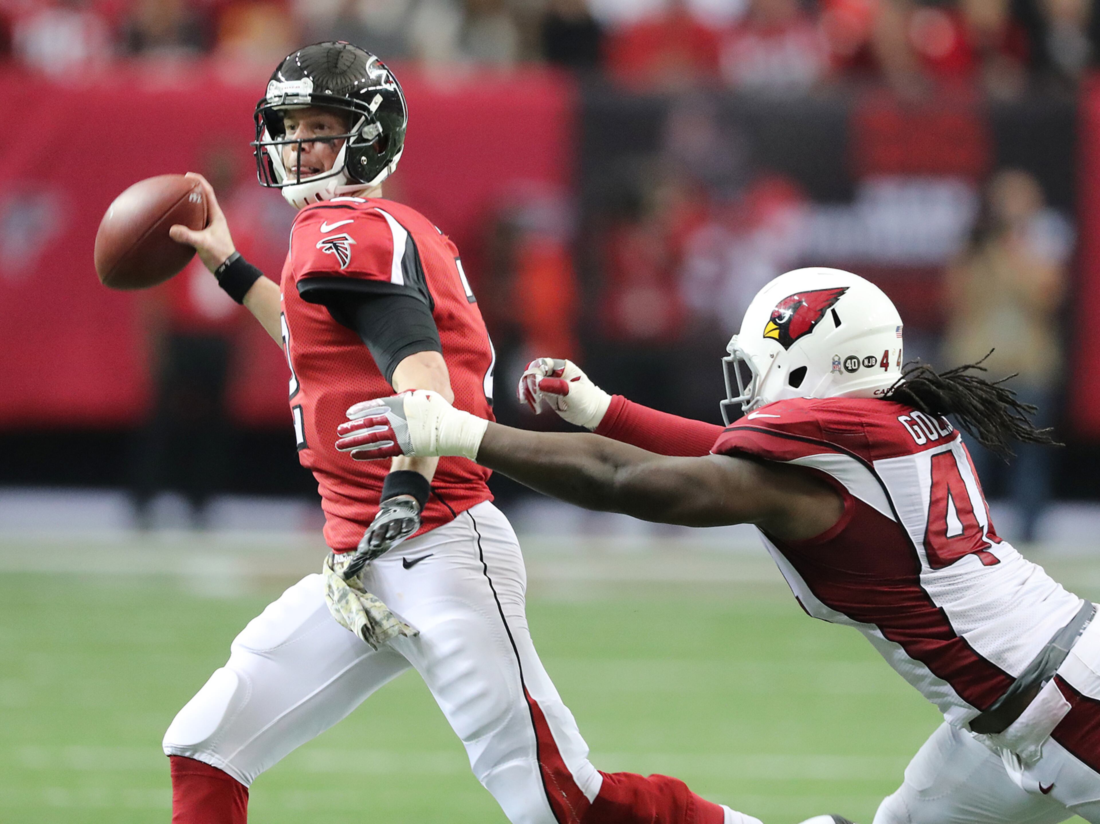 November 27, 2016, Atlanta: Falcons quarterback Matt Ryan looks to pass under pressure from Cardinals linebacker Markus Golden during the second half in an NFL football game on Sunday, Nov. 27, 2016, in Atlanta. Curtis Compton/ccompton@ajc.com