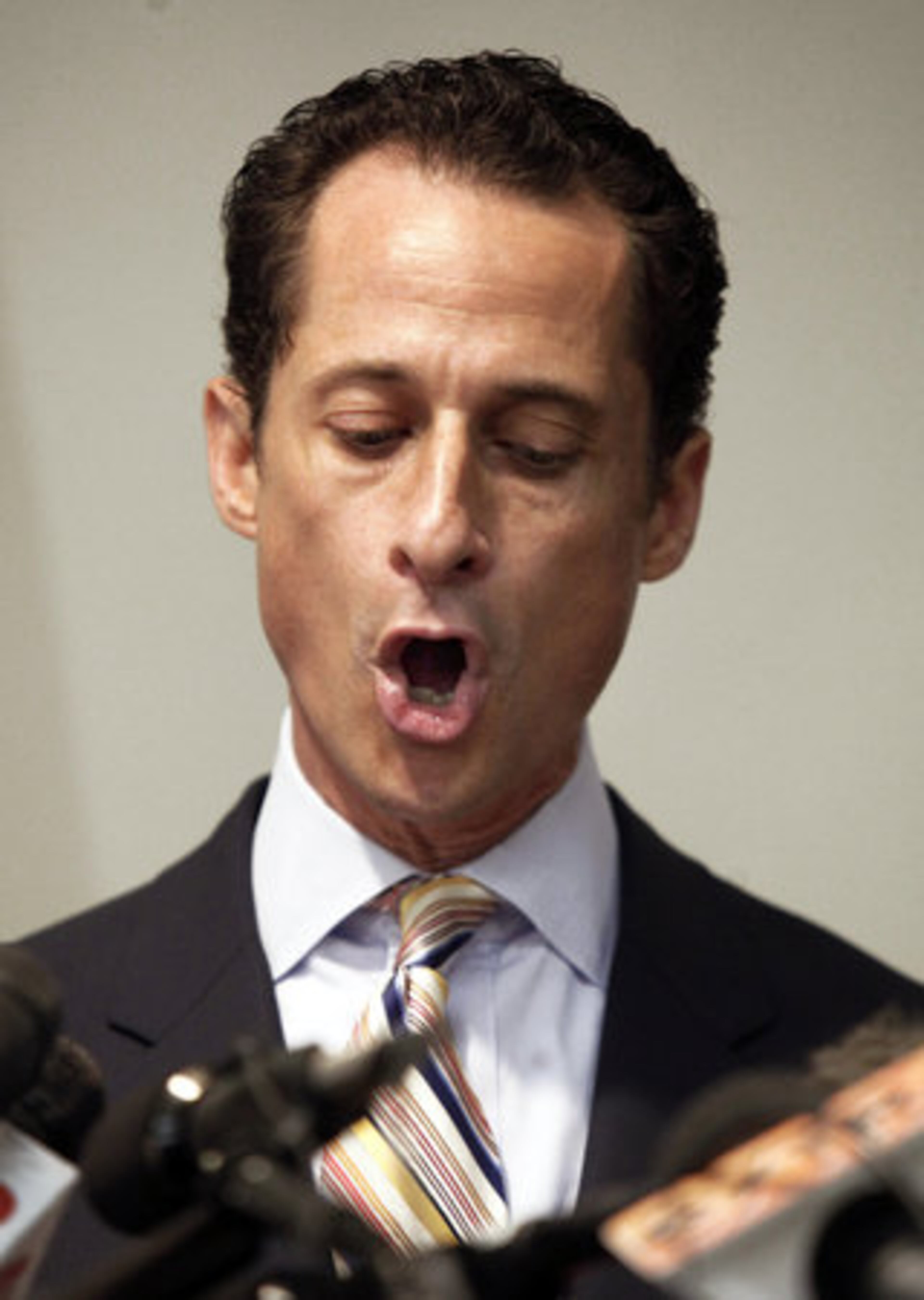 WHAT'S A WEINER-ROAST WITHOUT HECKLING? U.S. Rep. Anthony Weiner announces his resignation from Congress, in the Brooklyn borough of New York, Thursday, June 16, 2011. Weiner resigned from Congress, saying he cannot continue in office amid the intense controversy surrounding sexually explicit messages he sent online to several women. A cheer went up from the crowd when he announced his resignation, and profane questions were shouted out.