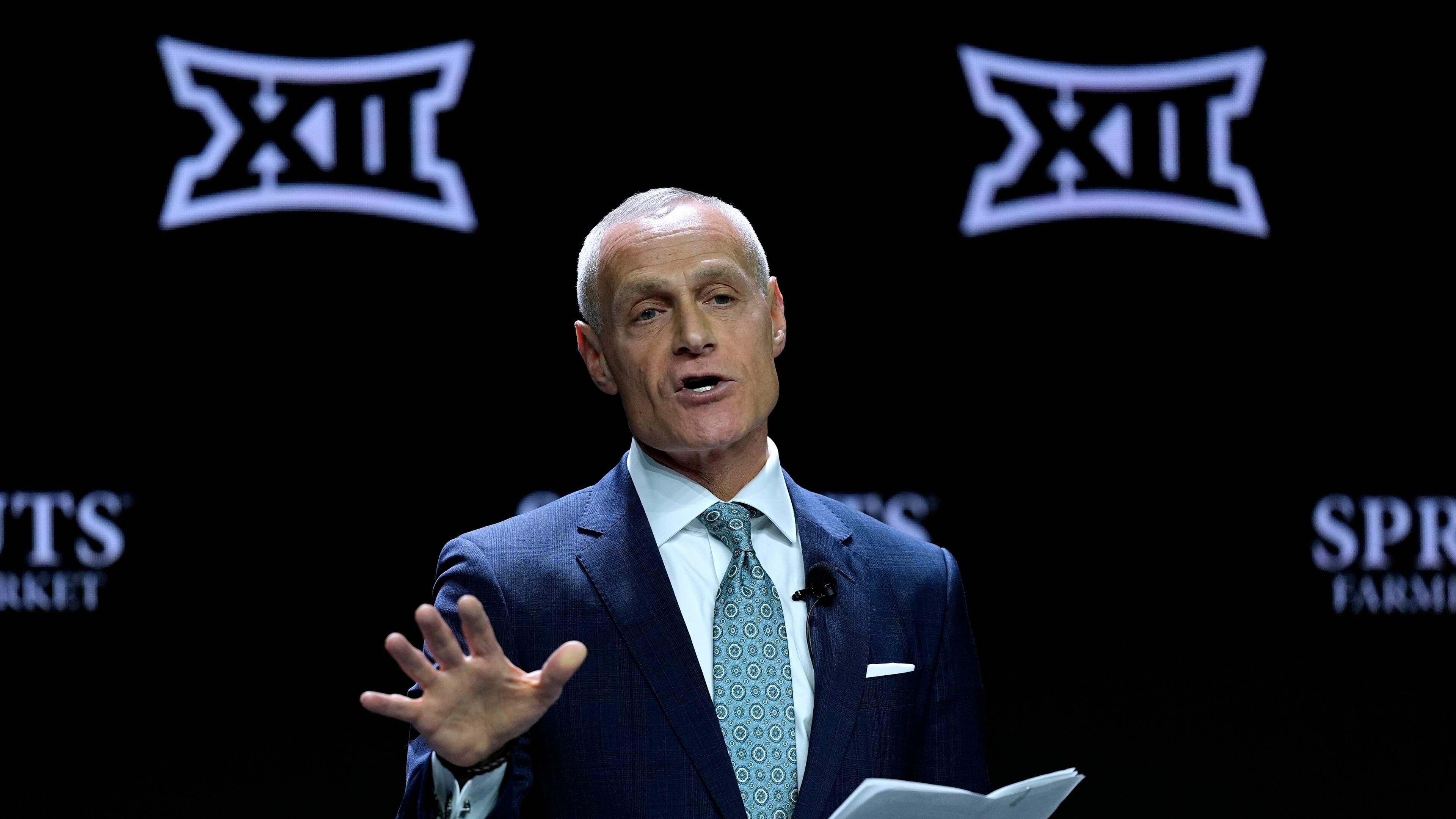 FILE - Big 12 Commissioner Brett Yormark addresses the media during the NCAA college Big 12 women's basketball media day, Oct. 22, 2024, in Kansas City, Mo. (AP Photo/Charlie Riedel, File)