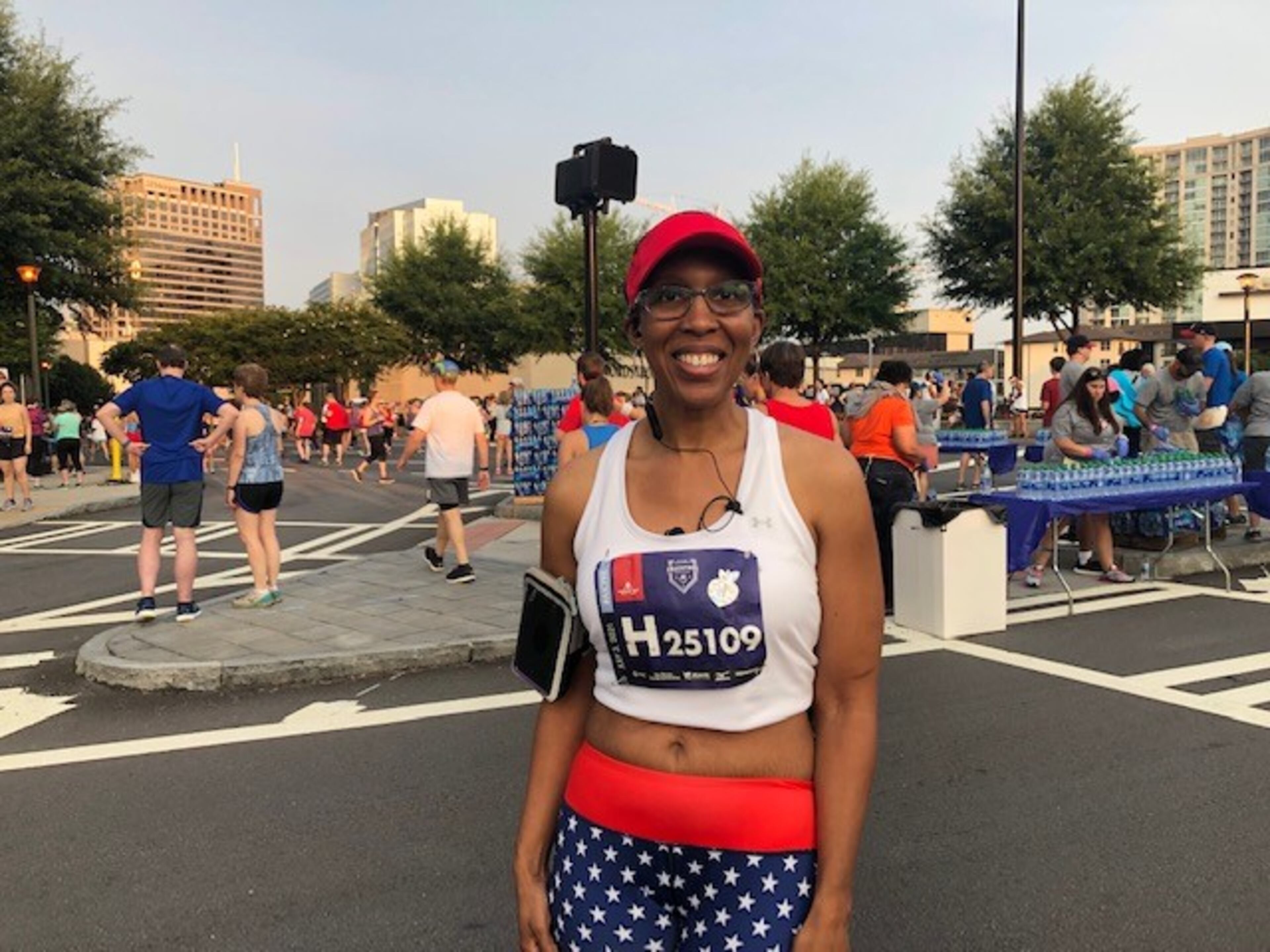 Kim Dorsey of Smyrna before the AJC Peachtree Road Race on July 3, 2021. Dorsey was to run her sixth Peachtree. "I just love being around people," she said. (AJC photo by Ken Sugiura)