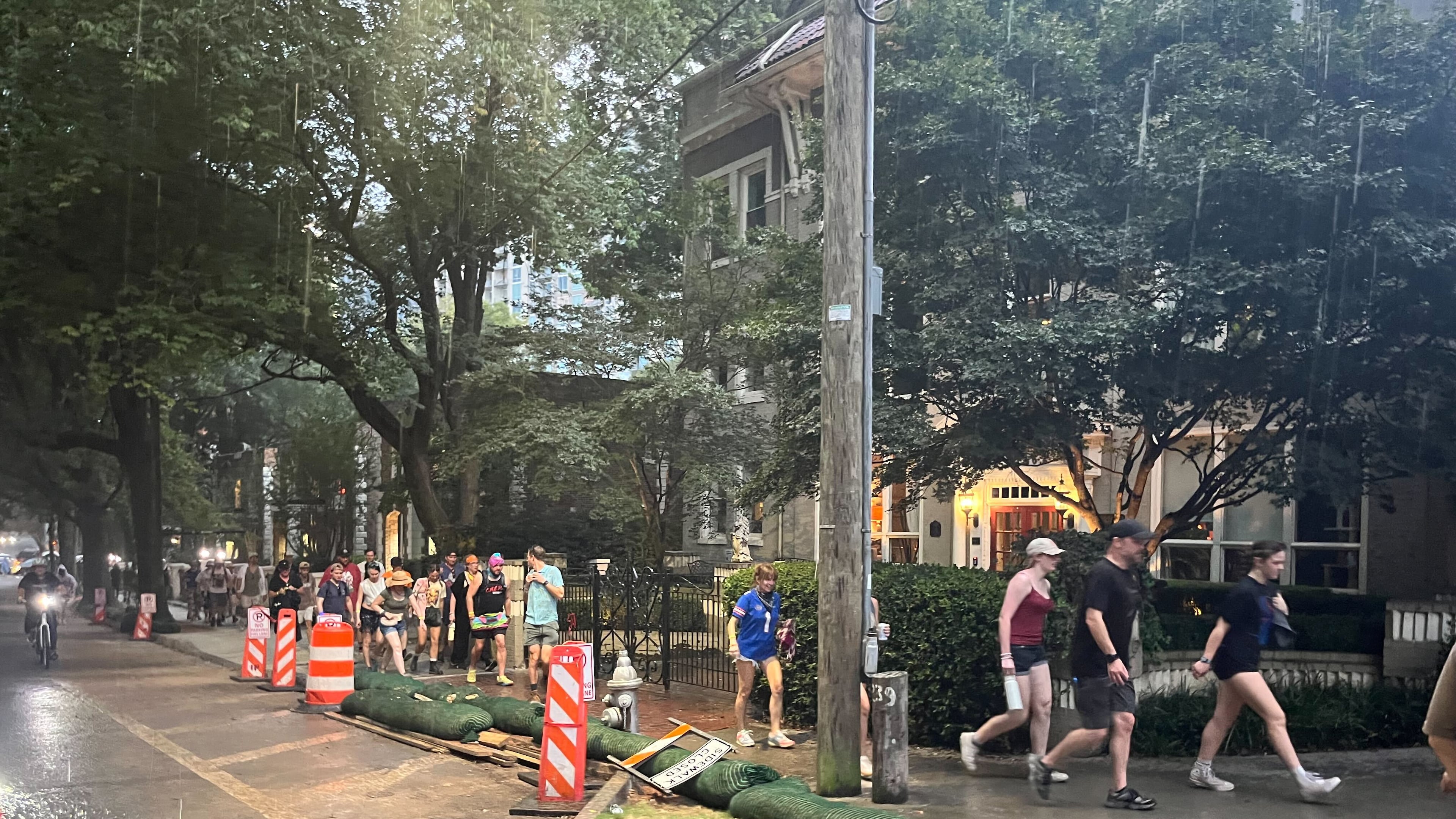 Festival goers leave Piedmont Park after Shaky Knees music festival was evacuated due to severe weather on Saturday, Sept. 19, 2026. (Lindsay Deutsch/AJC)