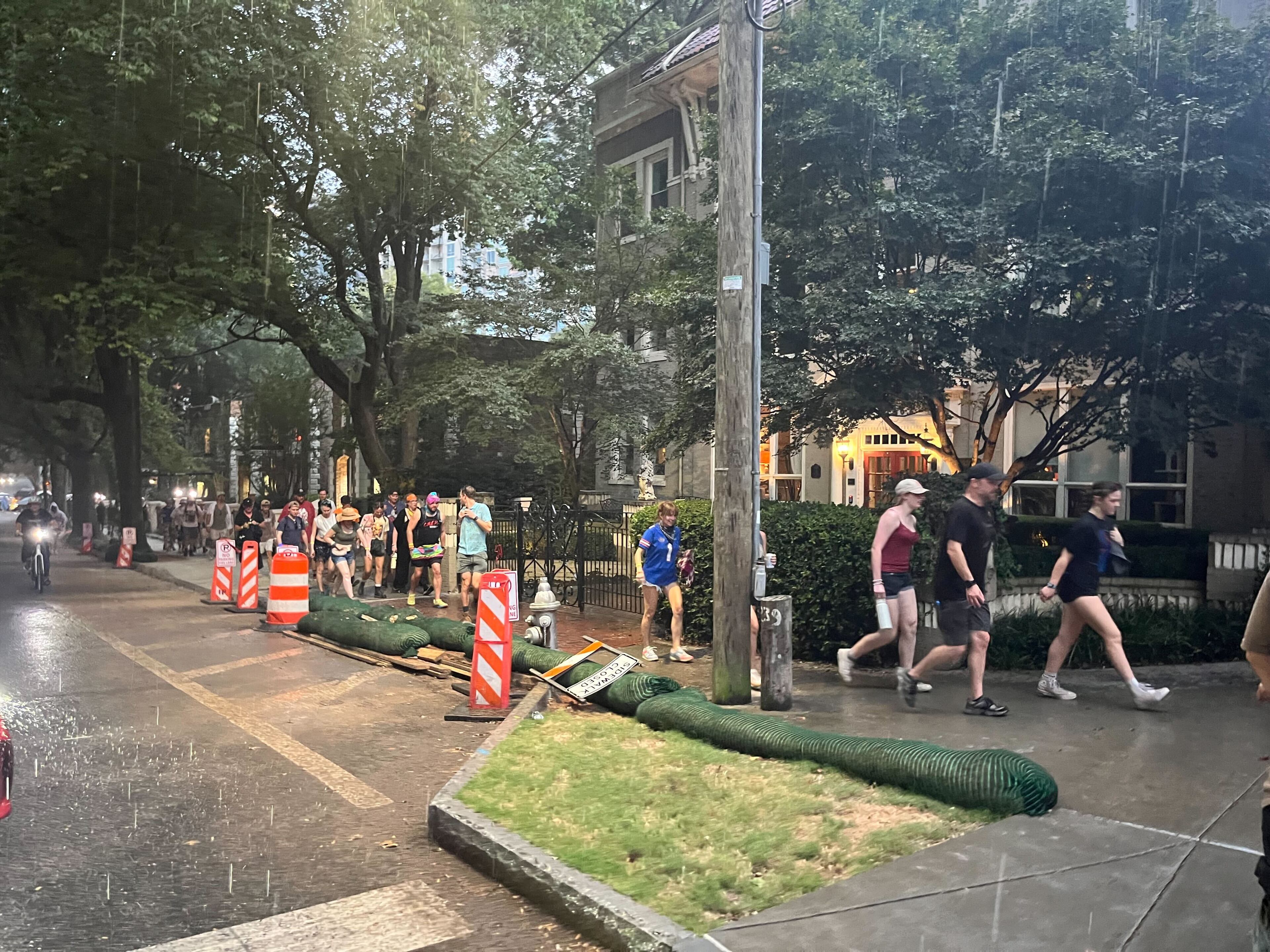 Festivalgoers leave Piedmont Park after Shaky Knees music festival was evacuated due to severe weather on Saturday, September 19, 2026.