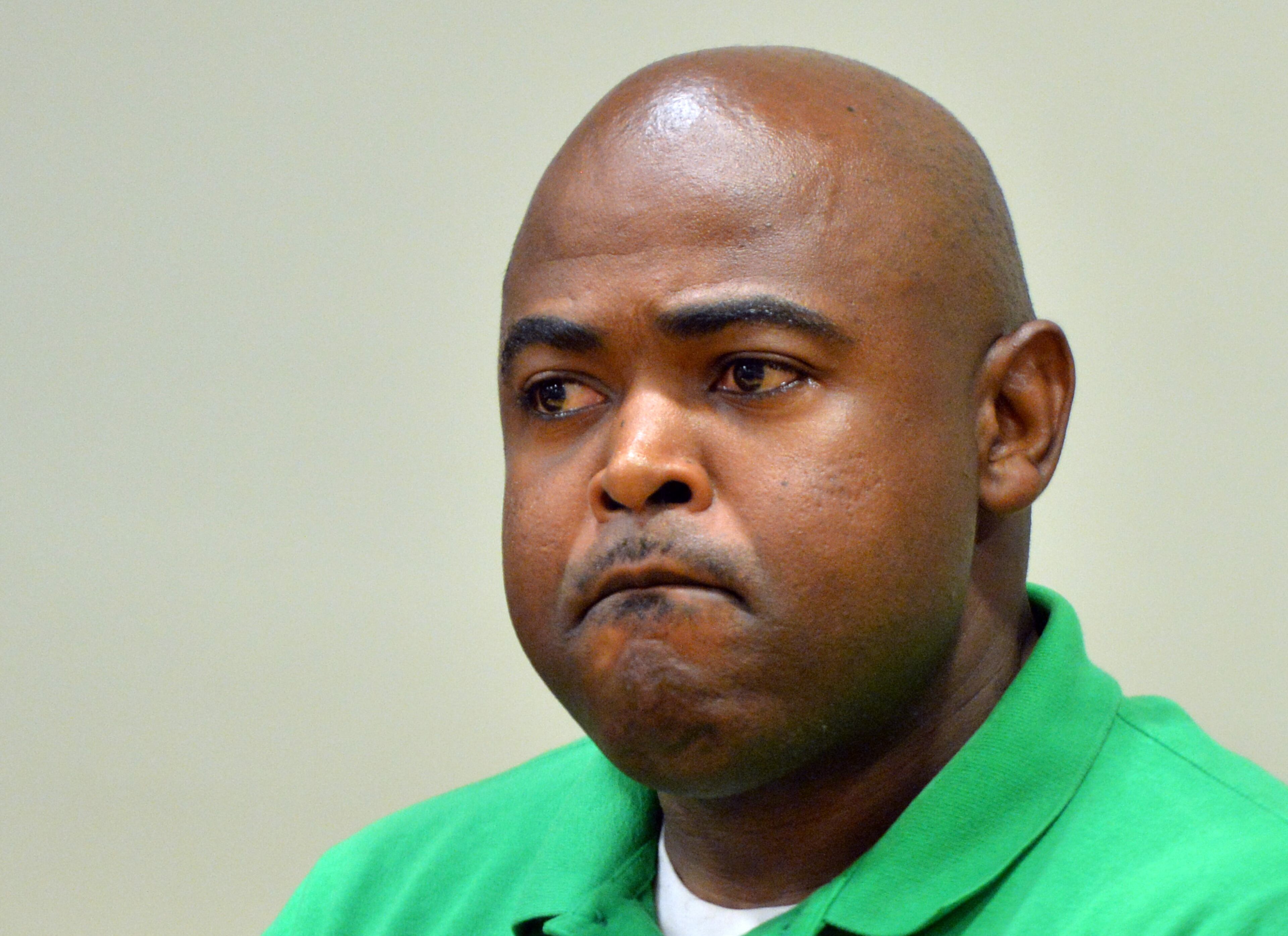 July 10, 2014 Lawrenceville - Rodney Wimbush testifies during a hearing of Recardo and Therian Wimbush before Gwinnett chief magistrate Christina Blum at Gwinnett Magistrate Court in Lawrenceville on Thursday, July 10, 2014. Bond has been denied for Recardo and Therian Wimbush being held on child cruelty charges that they kept their oldest child a prisoner in their home. HYOSUB SHIN / HSHIN@AJC.COM