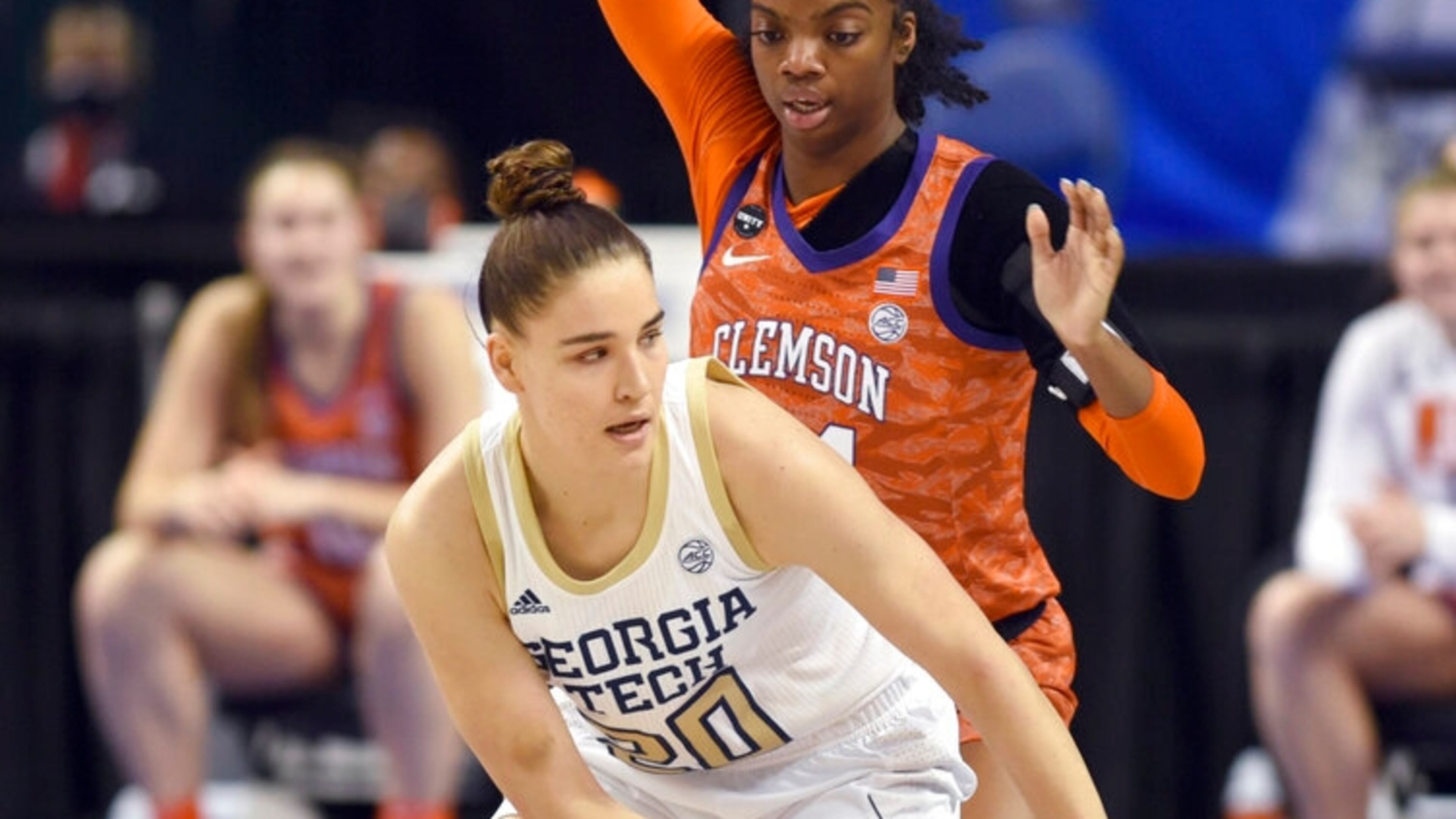 Georgia Tech's Nerea Hermosa is guarded by Clemson's Mikayla Hayes during an NCAA college basketball game in the quarterfinals of the Atlantic Coast Conference women's tournament Friday, March 5, 2021, in Greensboro, N.C. (Walt Unks/The Winston-Salem Journal via AP, Pool)