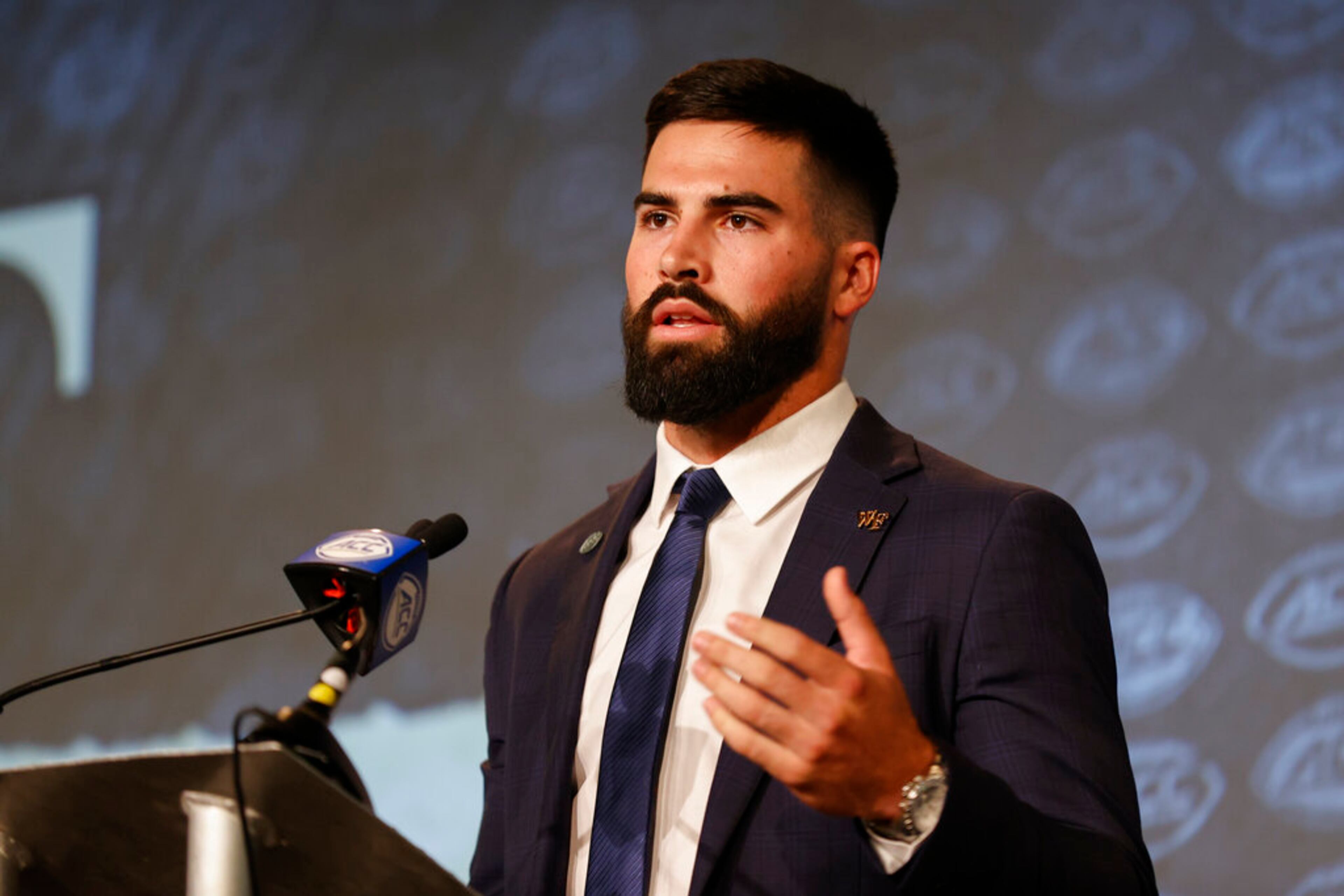 Wake Forest quarterback Sam Hartman answers a question at the NCAA college football Atlantic Coast Conference Media Days in Charlotte, N.C., Wednesday, July 20, 2022. (AP Photo/Nell Redmond)