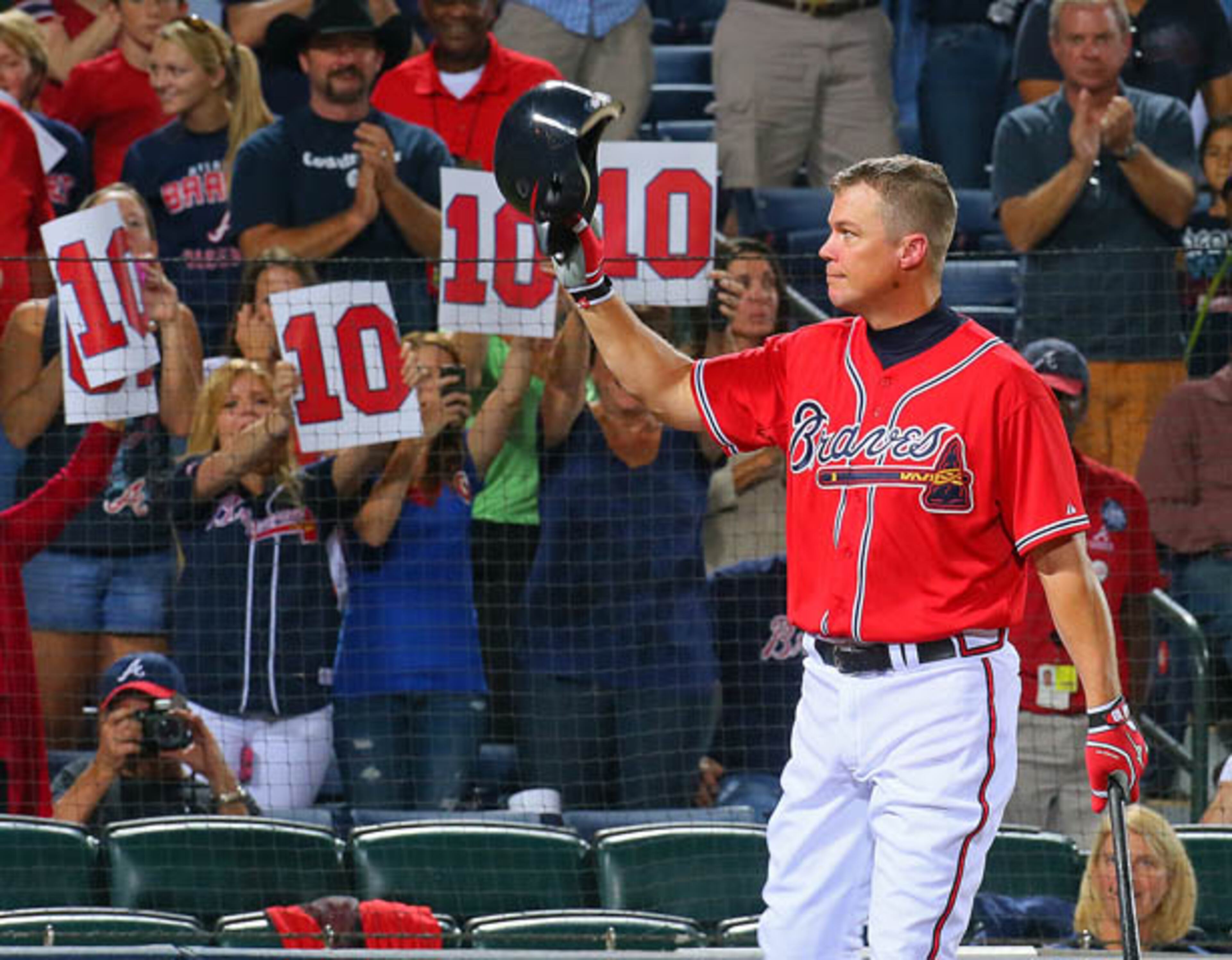 Chipper Jones tips his helmet to a standing ovation as he approaches the plate in the first inning following Chipper Jones tribute night at Turner Field - where Atlanta faced the N.Y. Mets in the regular season's final homestand.
