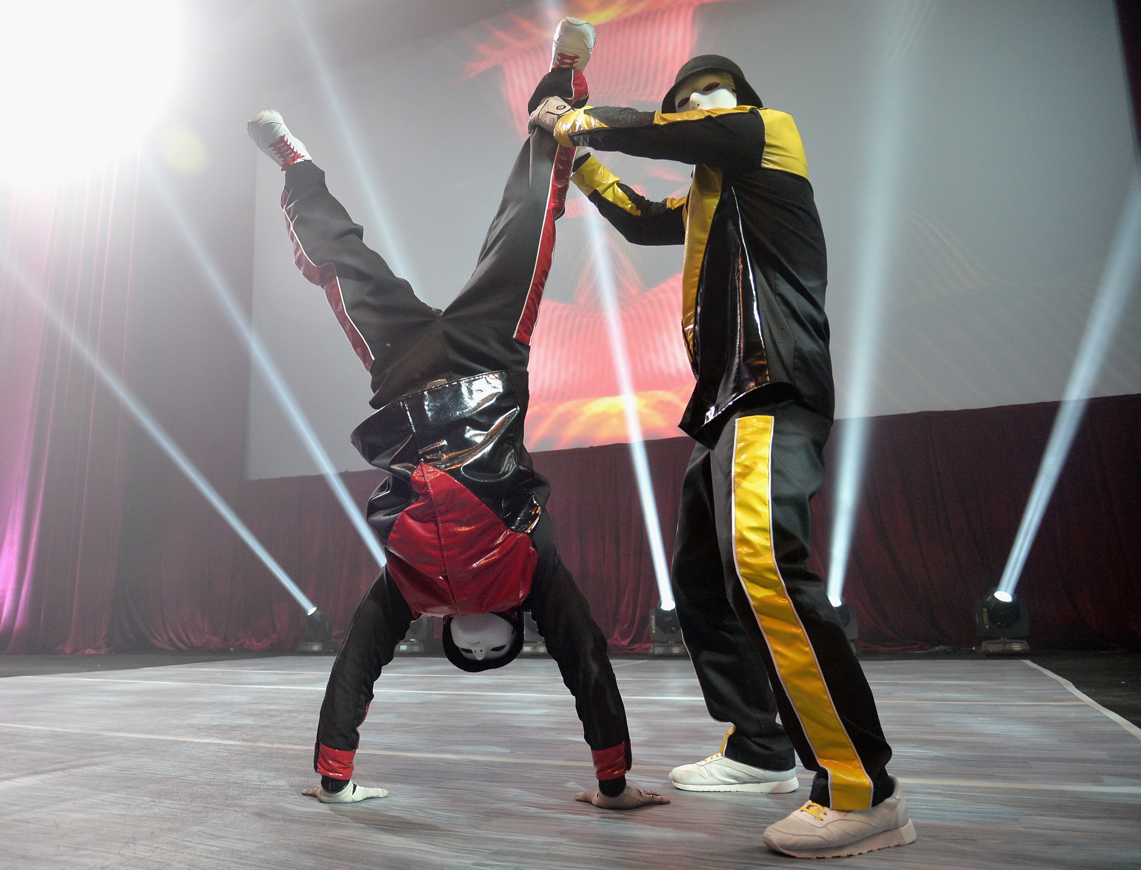 LAS VEGAS, NV - MARCH 25: Jabbawockeez performs onstage at “The Neighbors” Frat Party hosted by Universal Pictures in Conjunction with Dolby Laboratories at Caesars Palace during CinemaCon, the official convention of the National Association of Theatre Owners on March 25, 2014 in Las Vegas, Nevada. (Photo by Alberto E. Rodriguez/Getty Images for CinemaCon)